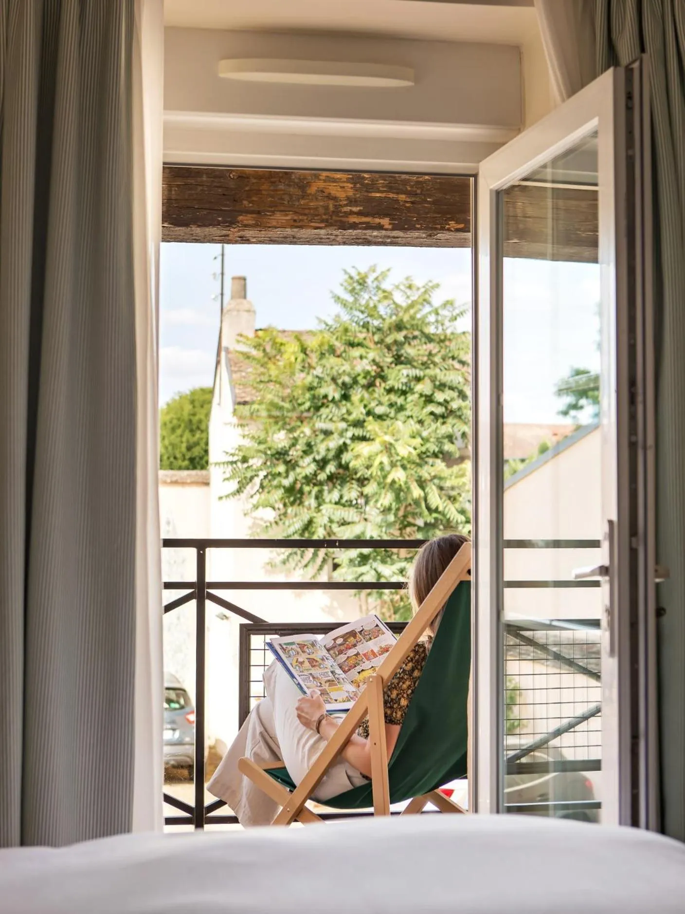 Garden view in ALFRED HOTELS Beaune La Madeleine