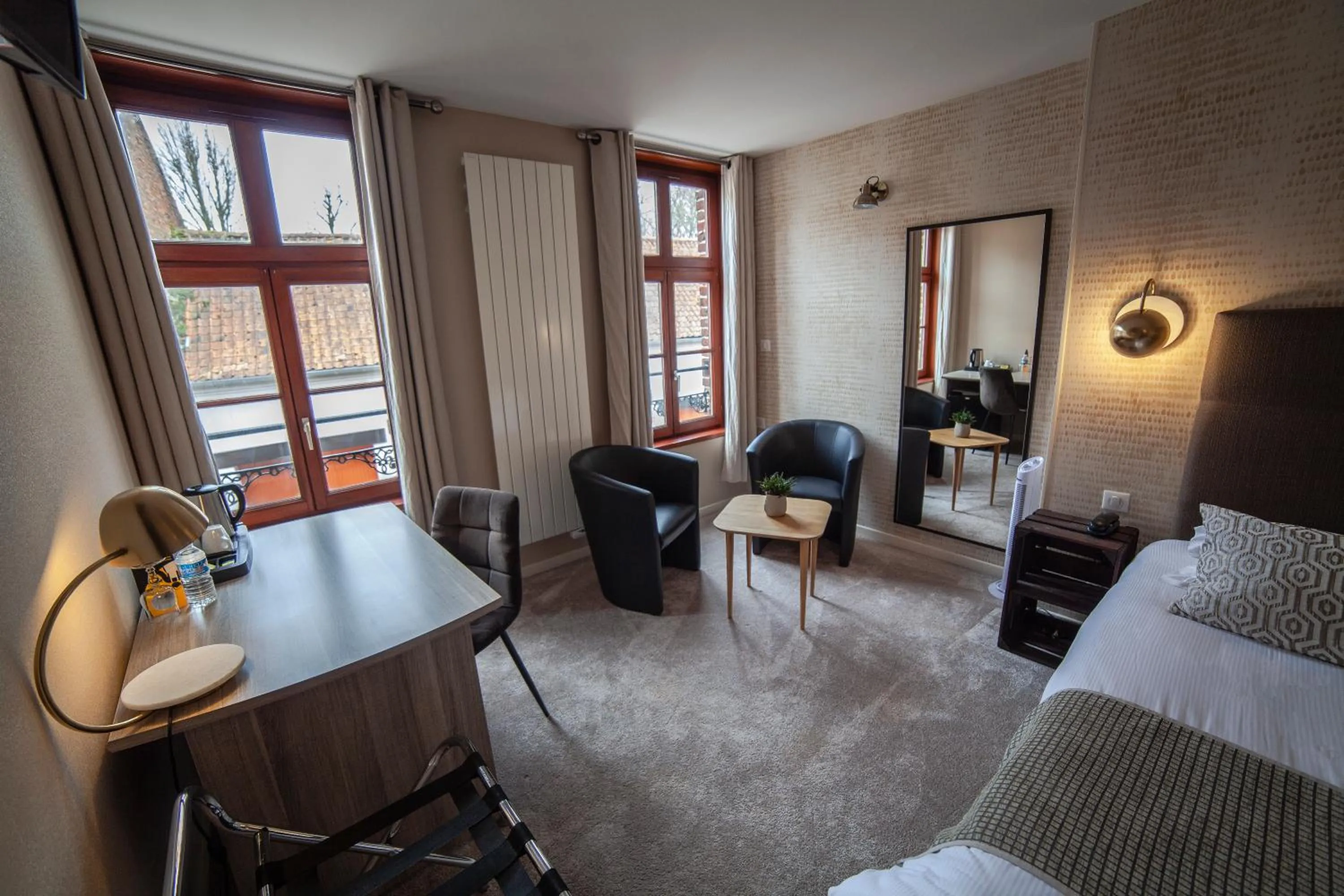 Seating area, Bed in Logis Hôtel & Restaurant - Les Hauts de Montreuil