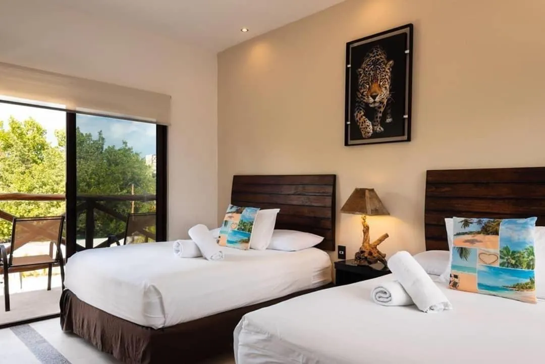 Bed in Villas Palmar Holbox