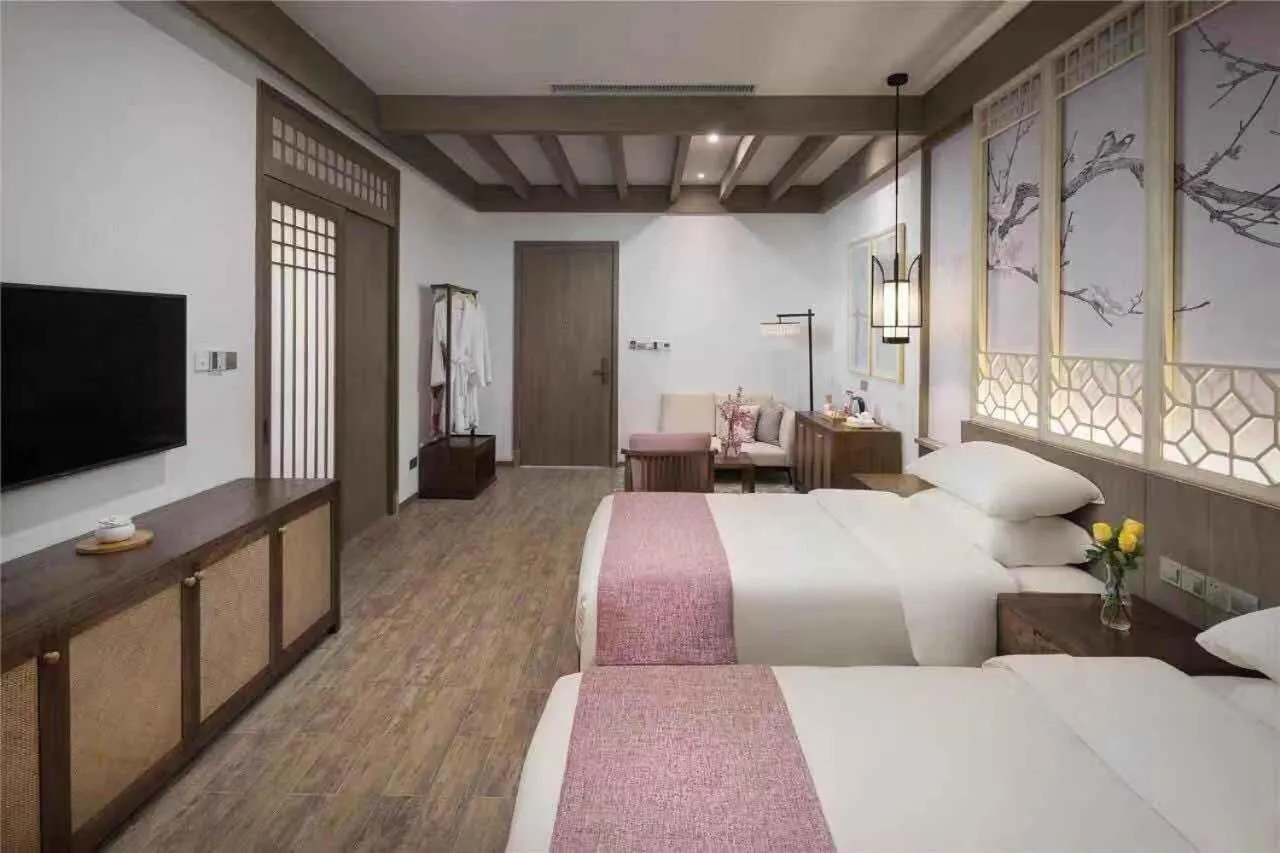 Bed in Blossom Hill Yuejingzhuang Hotel