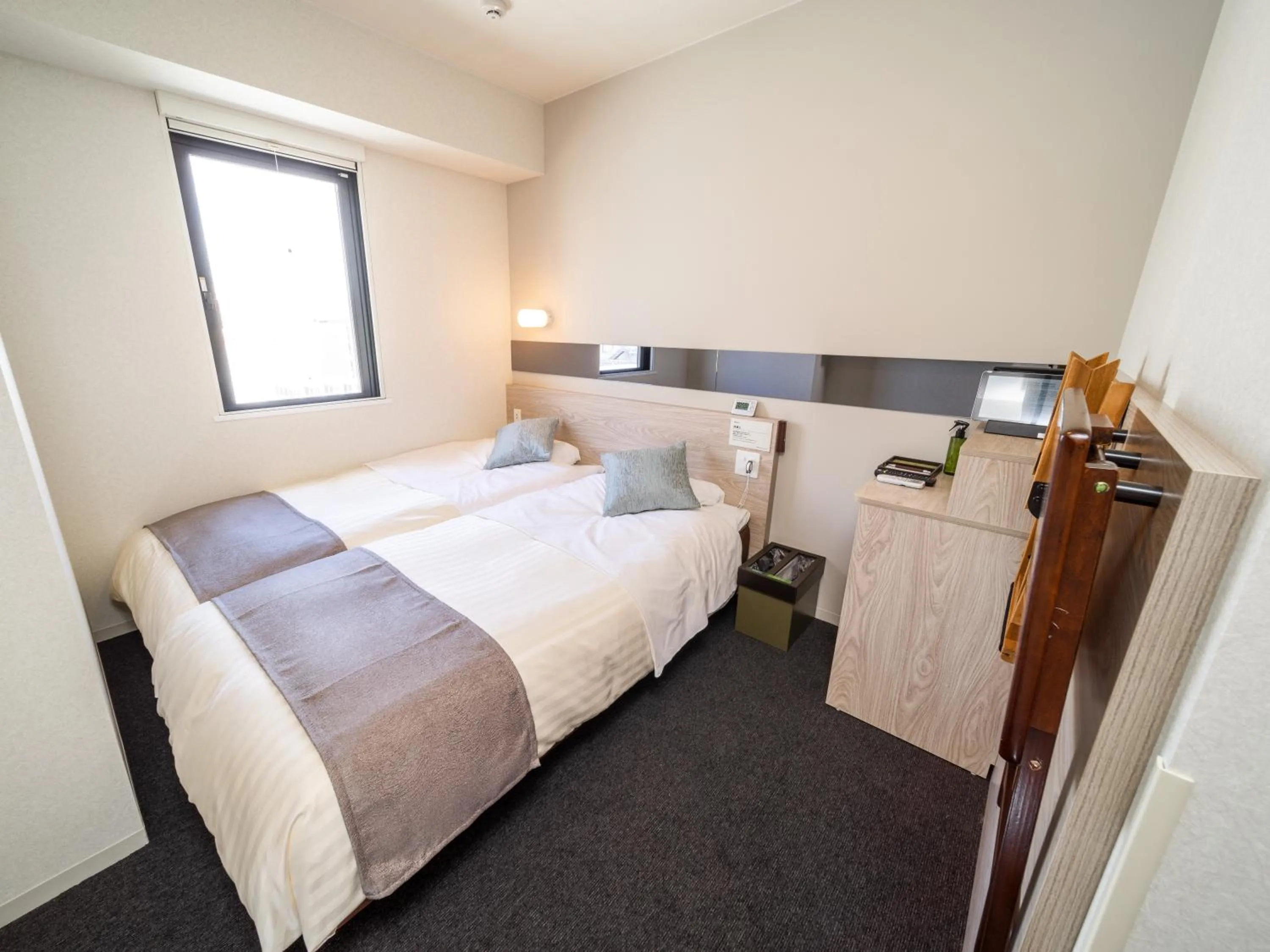 Bed in Super Hotel Premier Akihabara