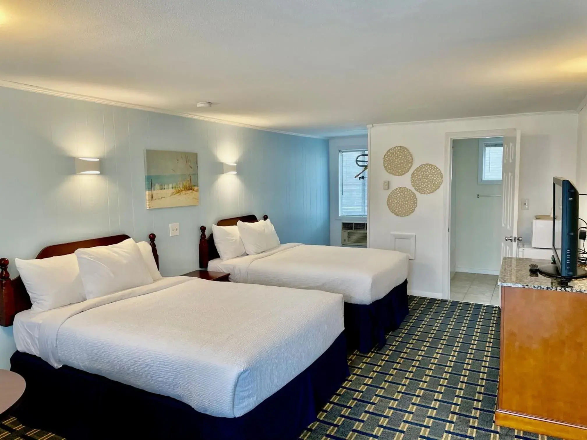 Standard Room with Two Double Beds in Ocean Breeze Motel Standard Room with Two Double Beds in Ocean Breeze Motel