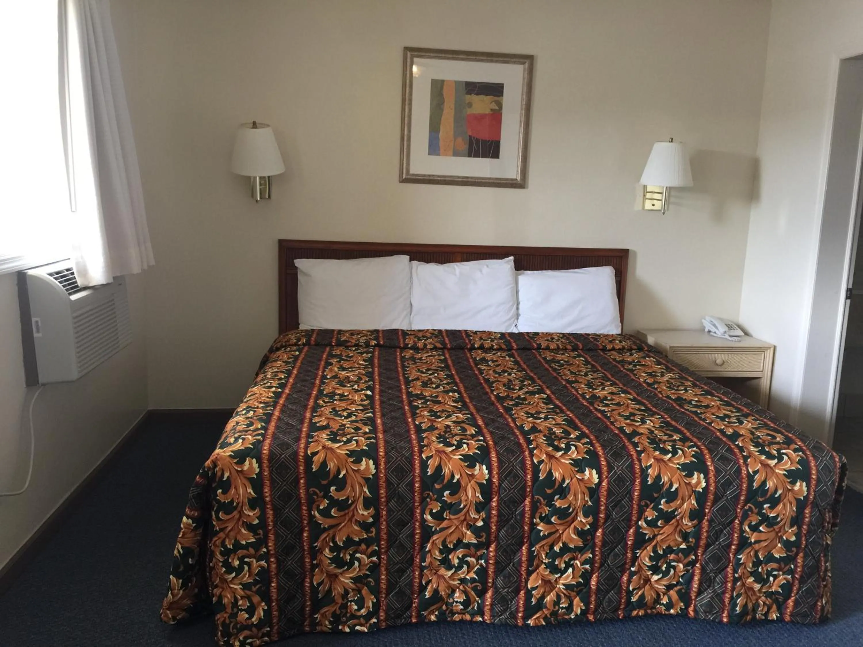 Bed in Coastal Motel