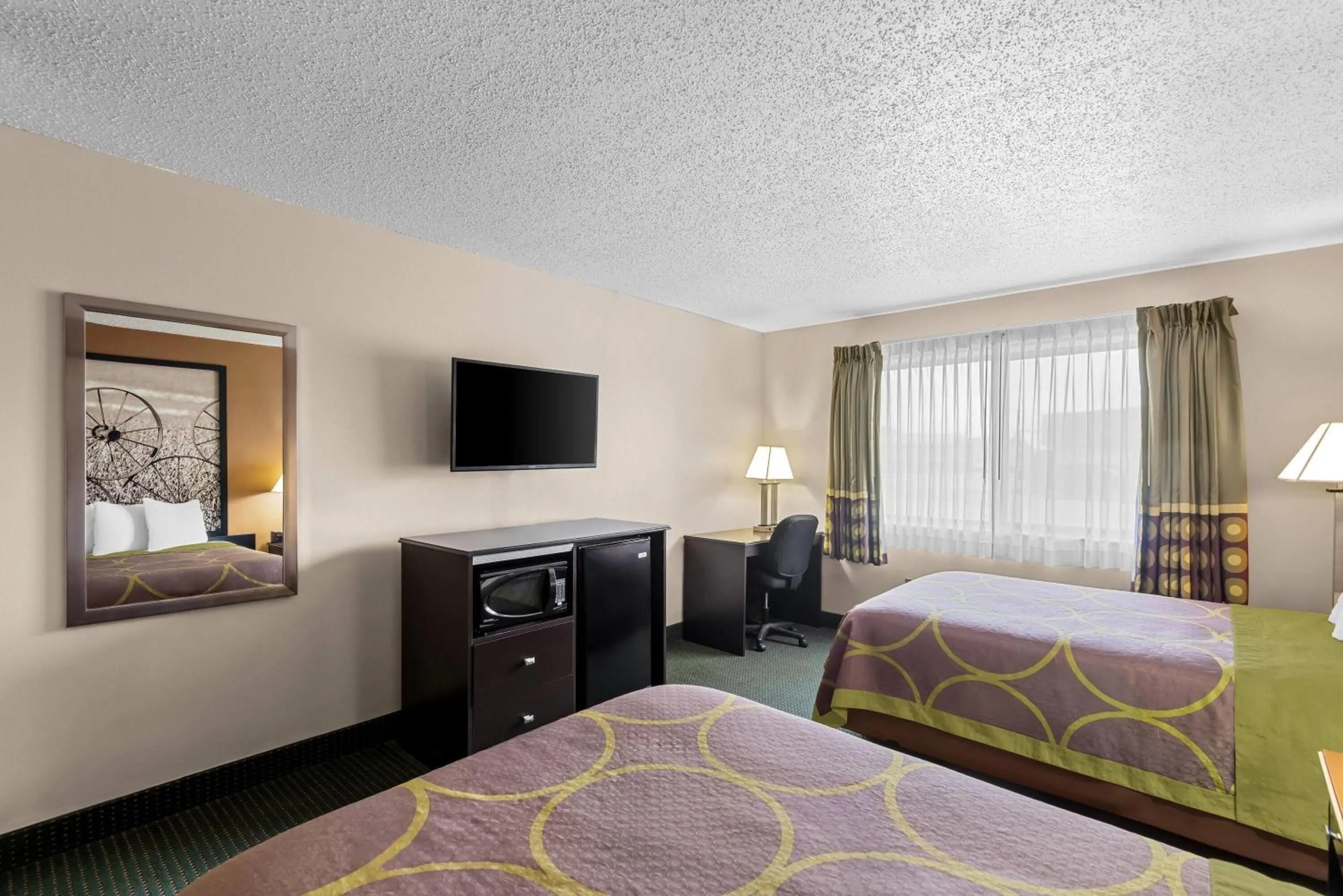 Bed in Super 8 by Wyndham Jefferson