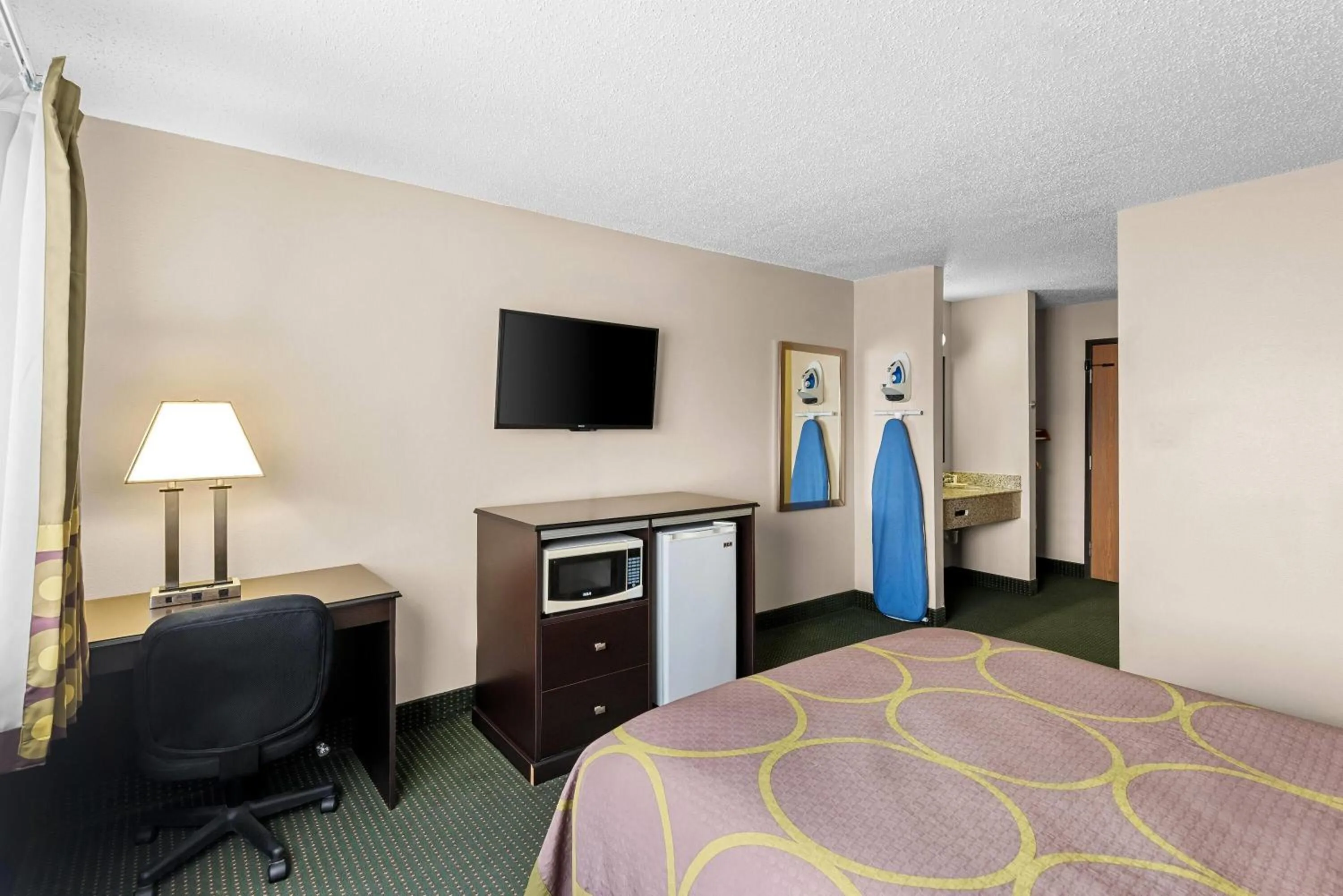 Bed in Super 8 by Wyndham Jefferson