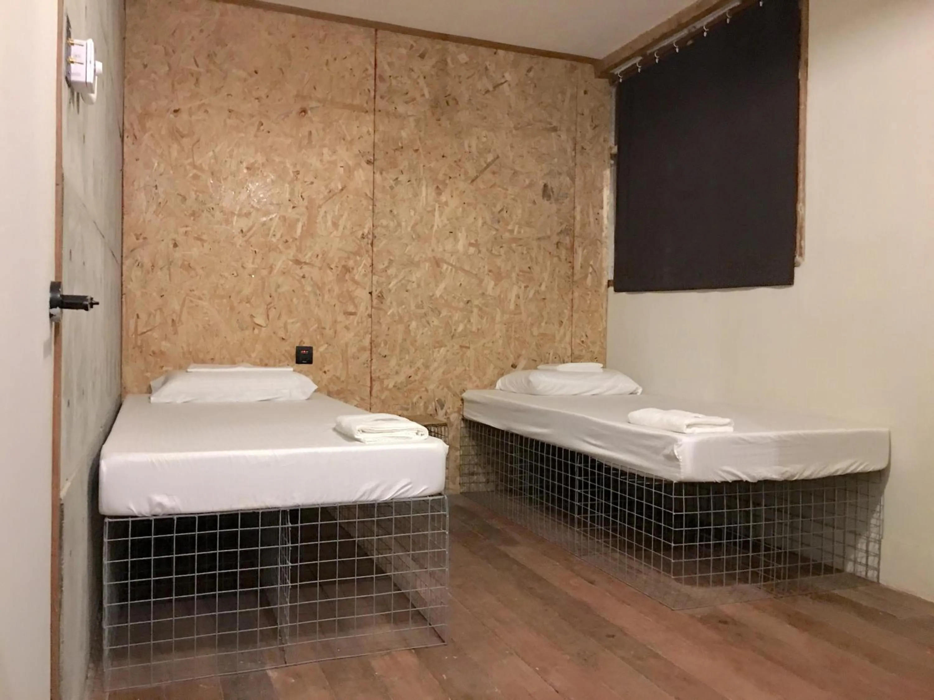 Photo of the whole room, Bed in The Flying Fish Hostel Cebu