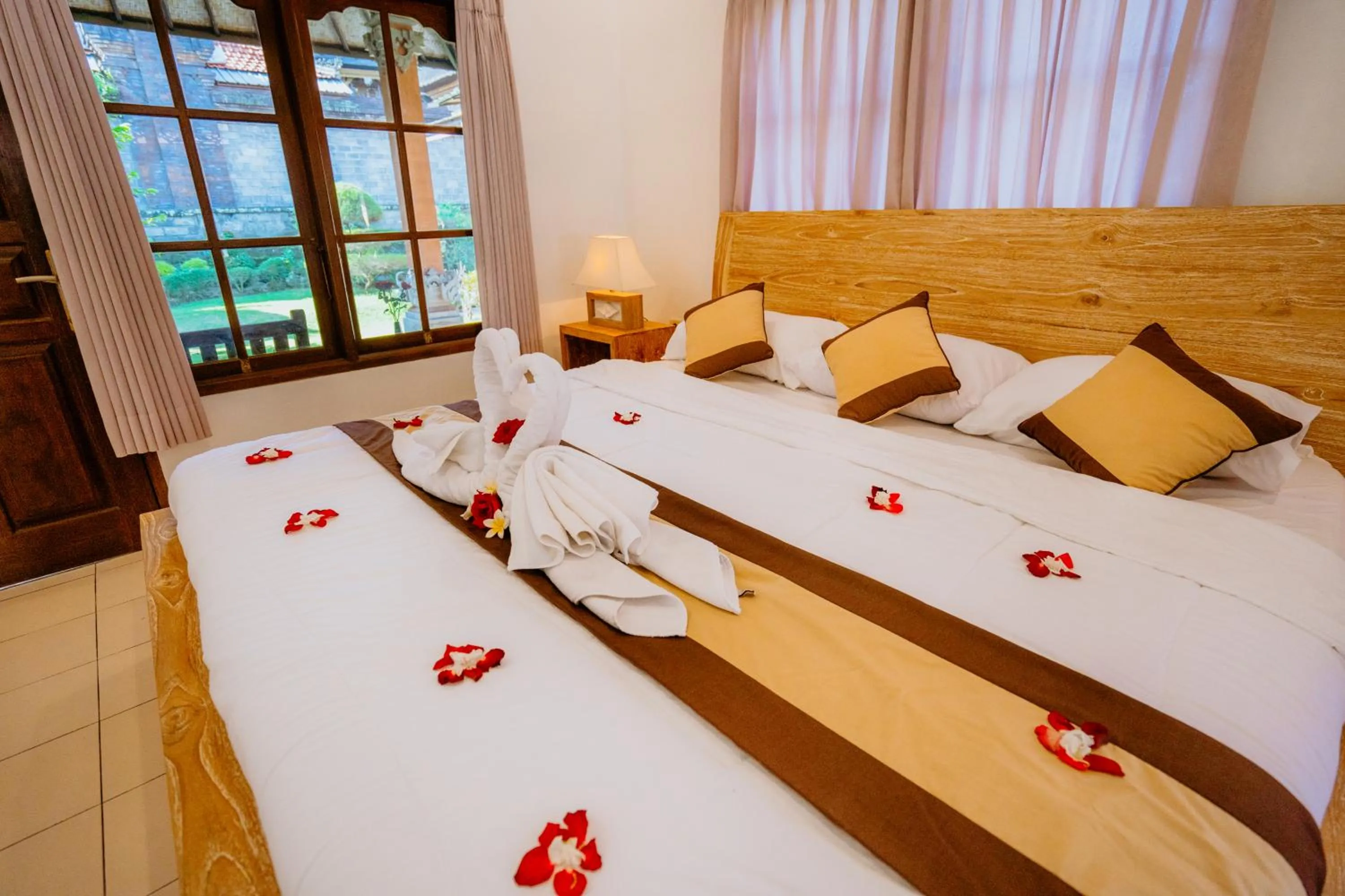 Bed in Rahayu Guest House Ubud