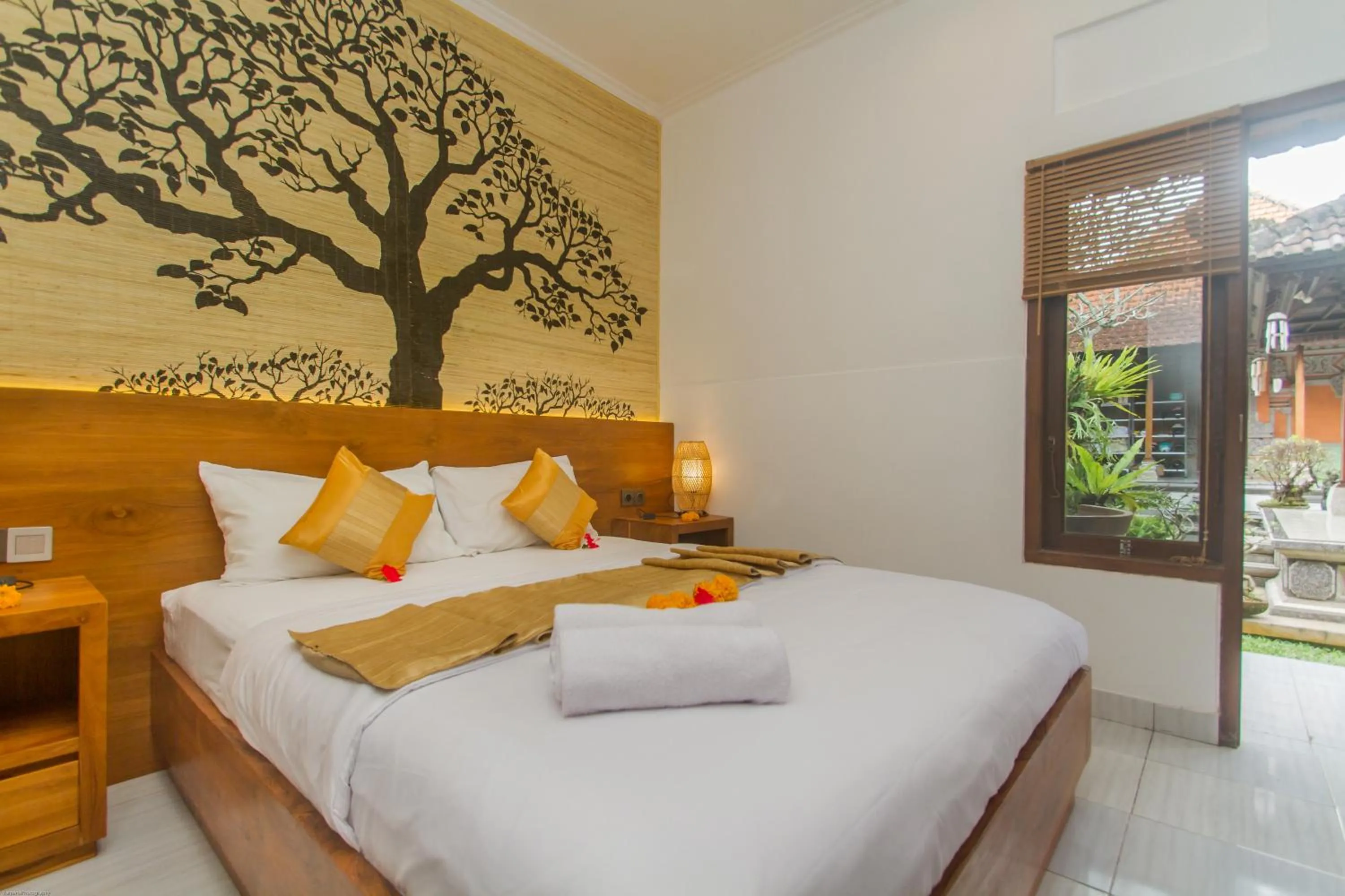 Bed in Rahayu Guest House Ubud