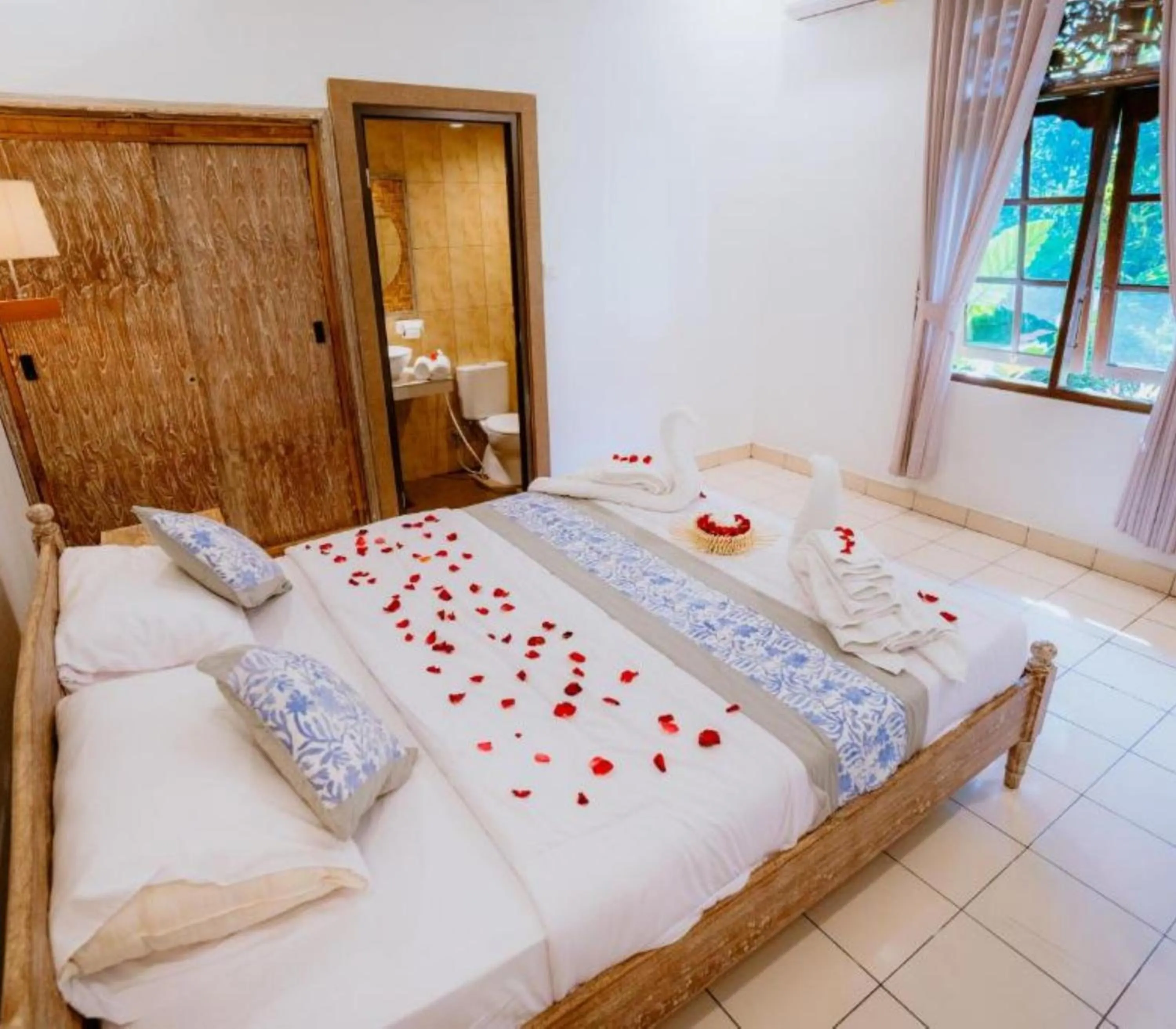 Bed in Rahayu Guest House Ubud