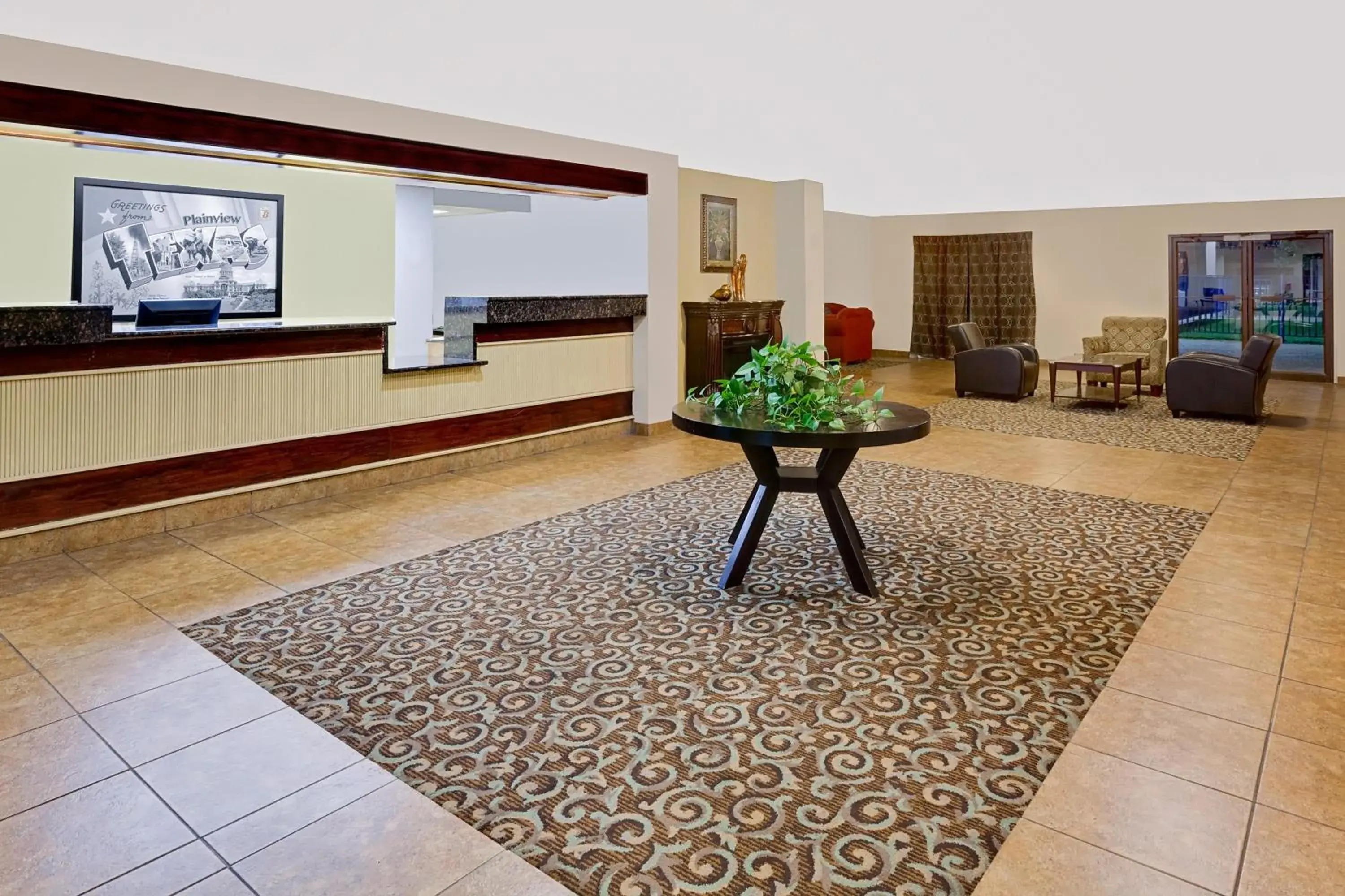 Lobby or reception in Super 8 by Wyndham Plainview Lobby or reception in Super 8 by Wyndham Plainview