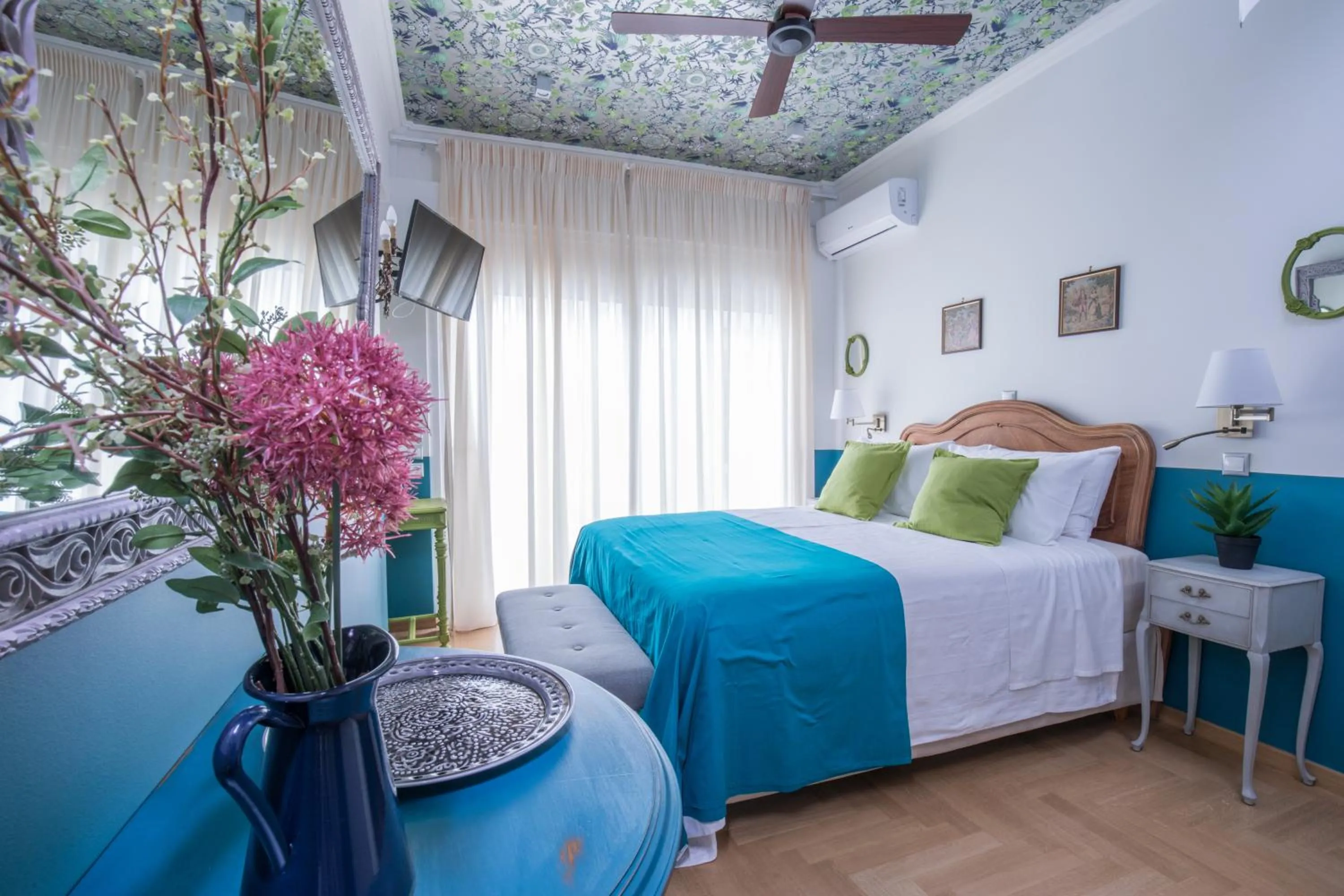 Bed in Rastoni Athens Suites near Acropolis at Tsatsou street