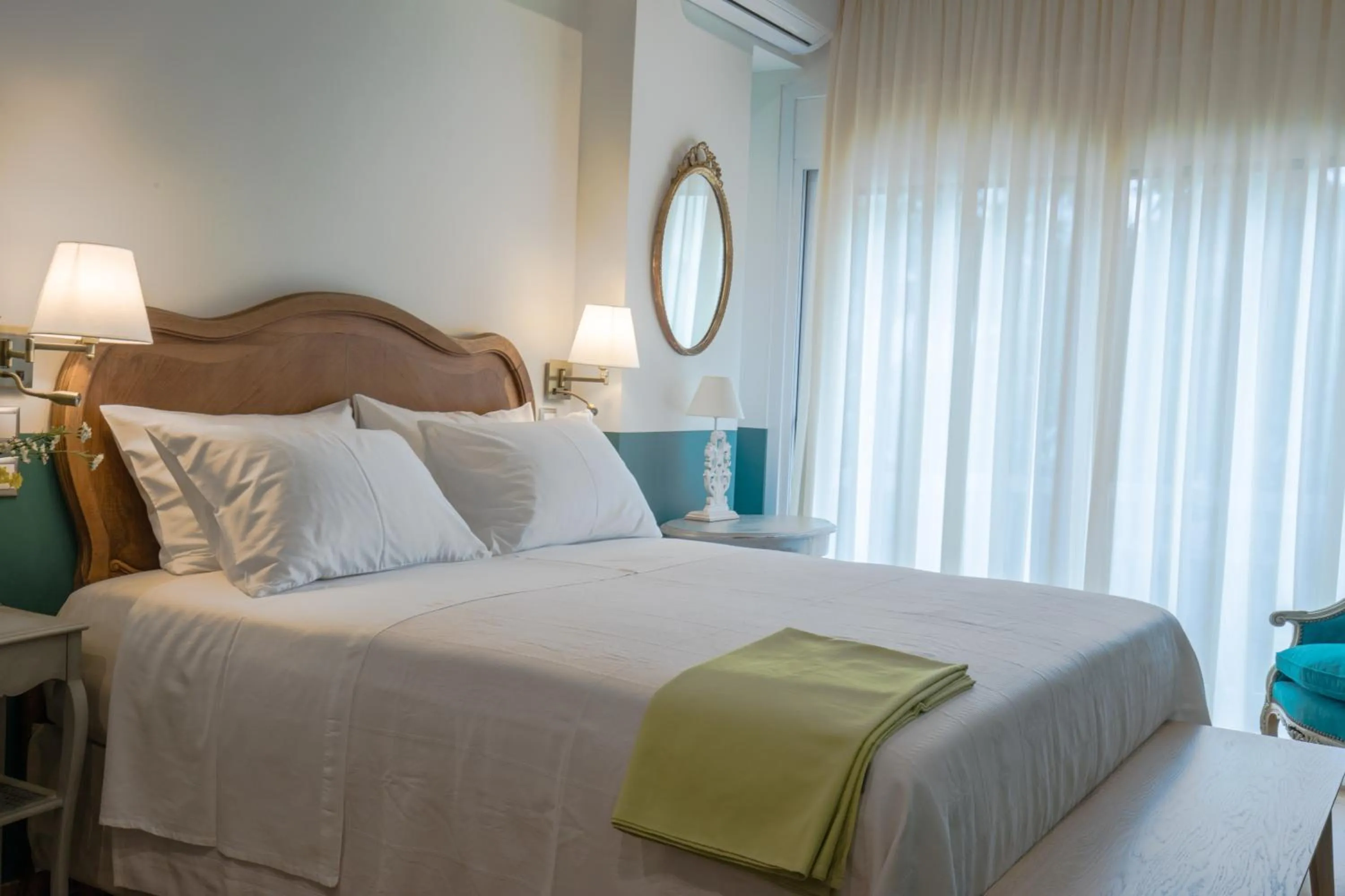 Bed in Rastoni Athens Suites near Acropolis at Tsatsou street