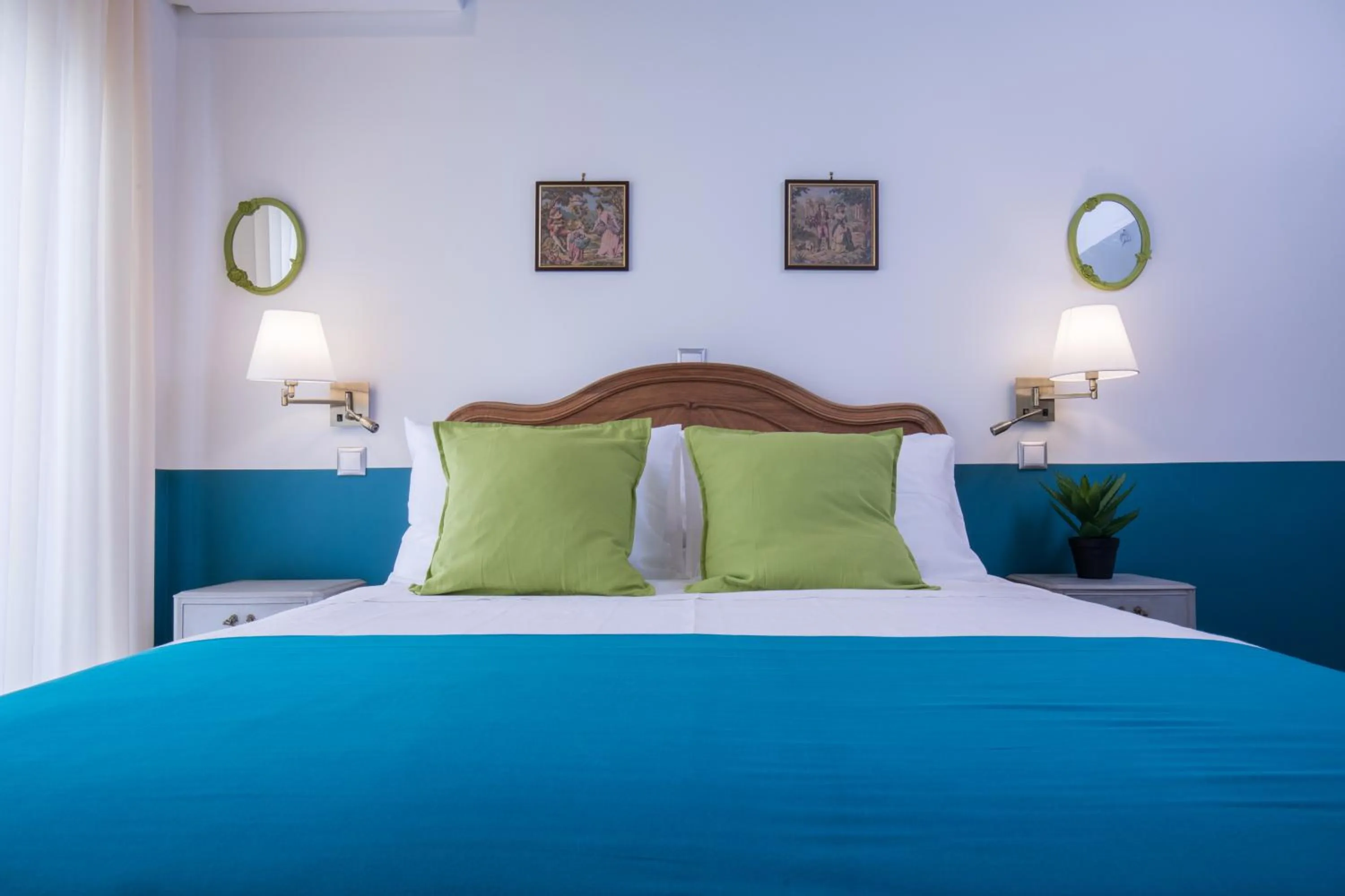 Bed in Rastoni Athens Suites near Acropolis at Tsatsou street