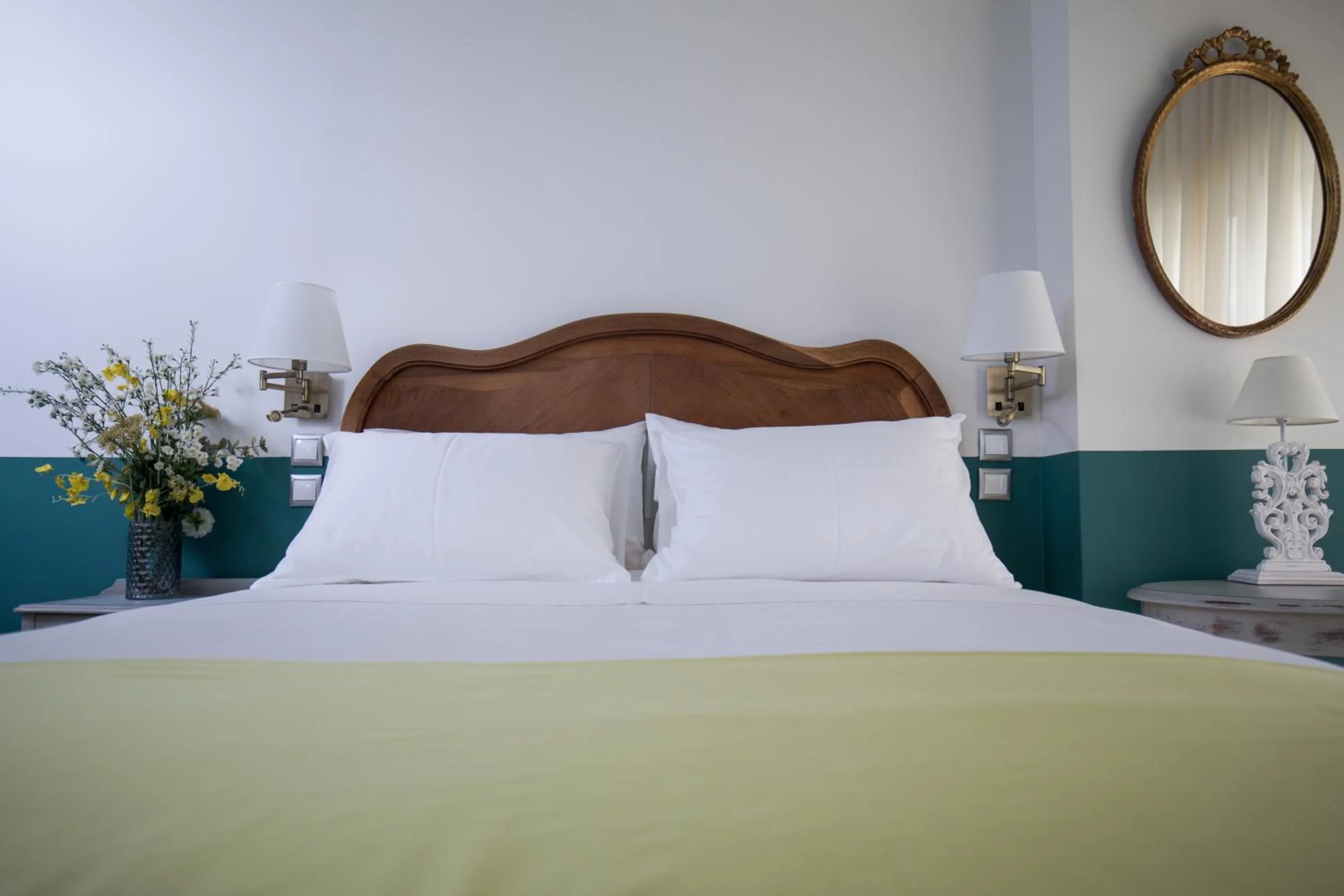 Bed in Rastoni Athens Suites near Acropolis at Tsatsou street