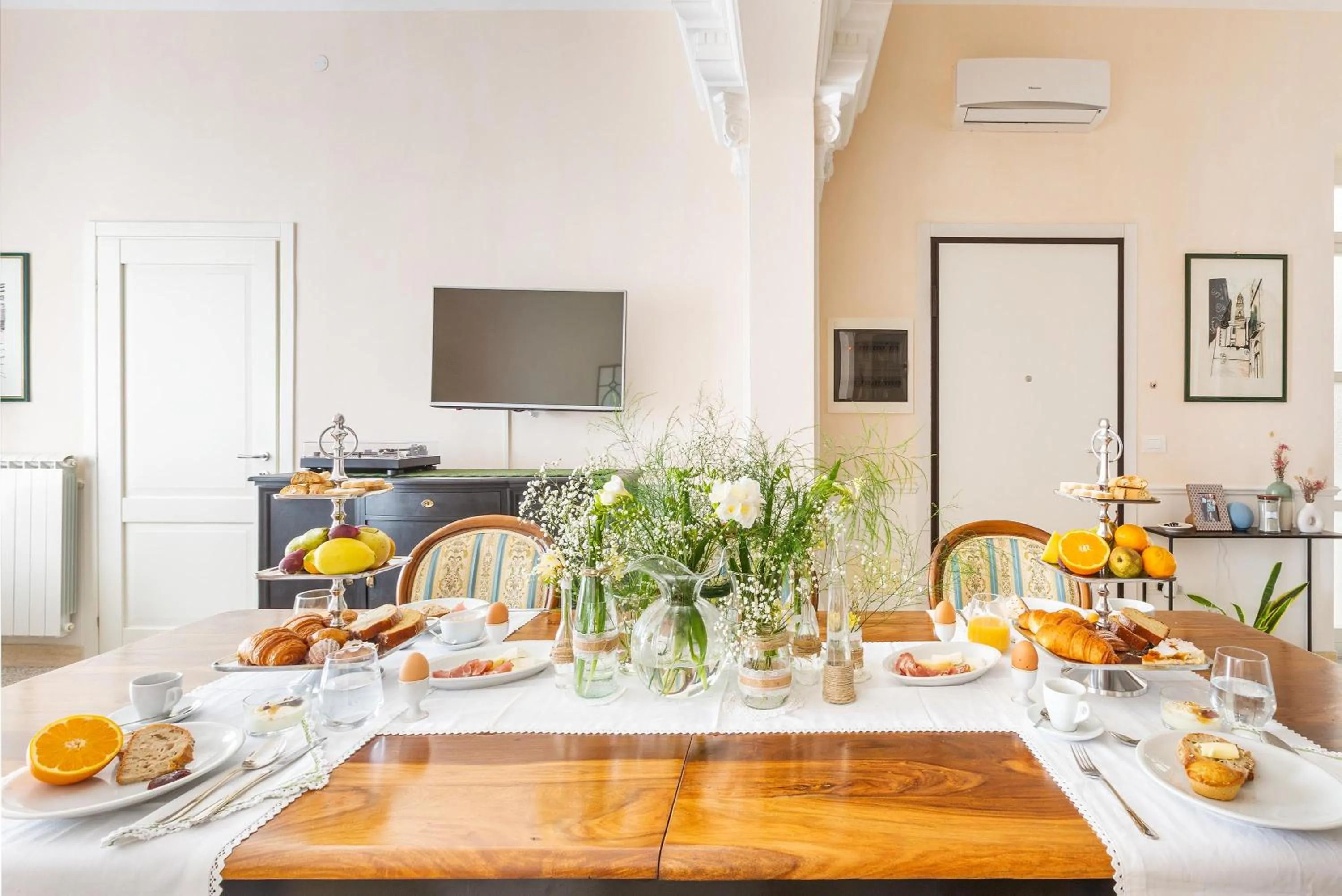 Communal lounge/ TV room in Dimora Le Tre Muse Guesthouse