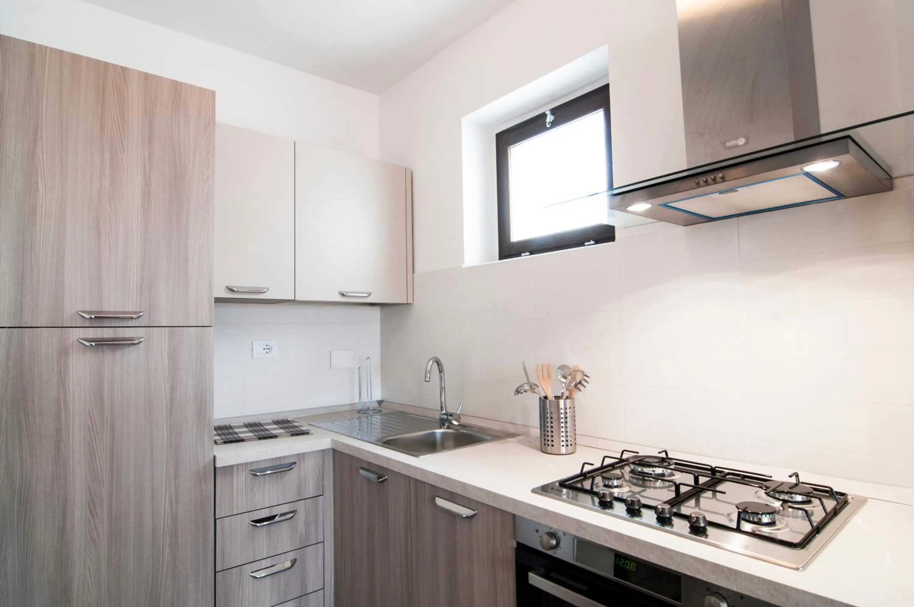 Kitchen or kitchenette in GuestHost - Fonte Laurentina Apartments