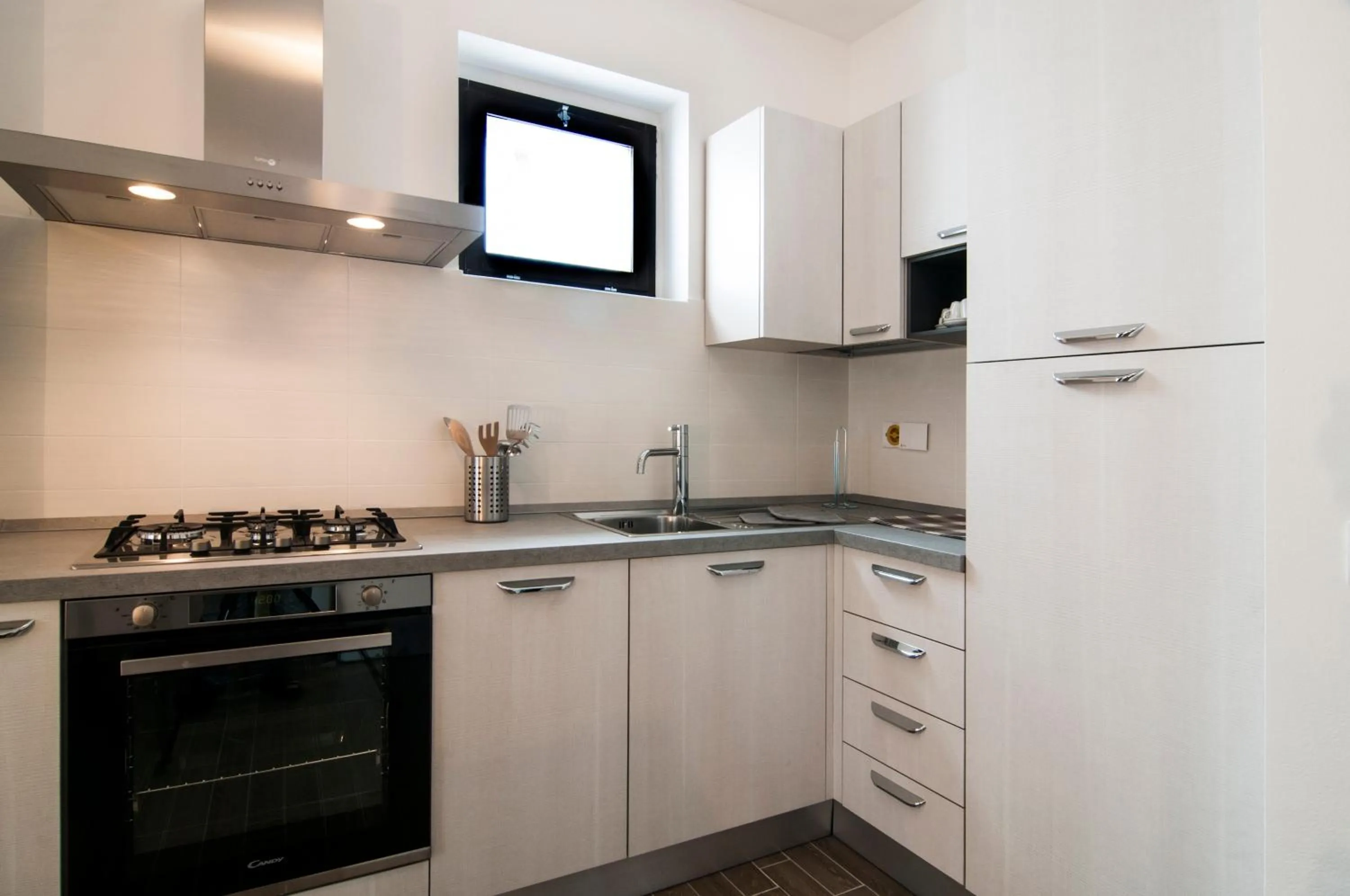 Kitchen or kitchenette in GuestHost - Fonte Laurentina Apartments