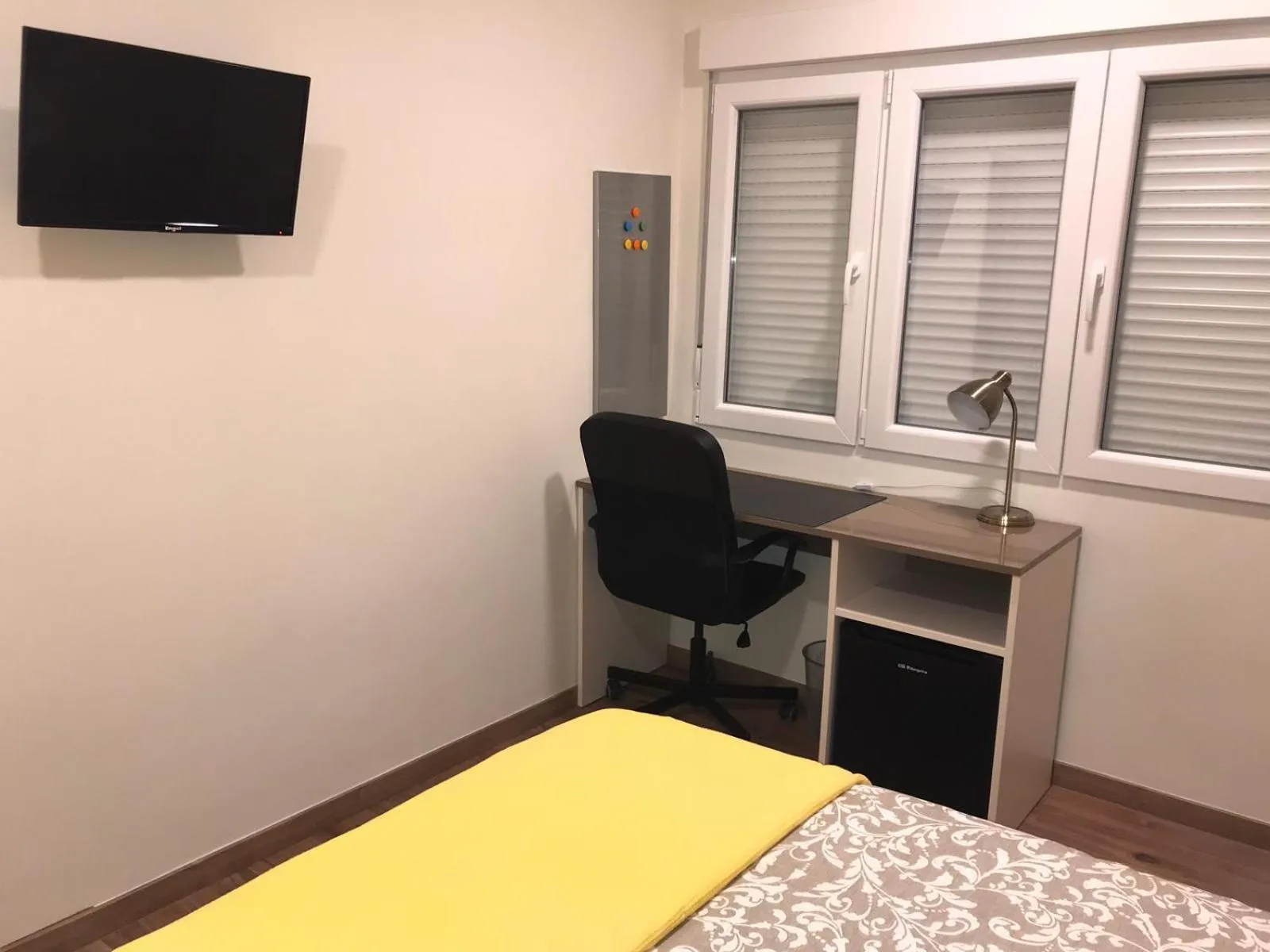 Bed in RESIDENCIA COMPOSTELA 2