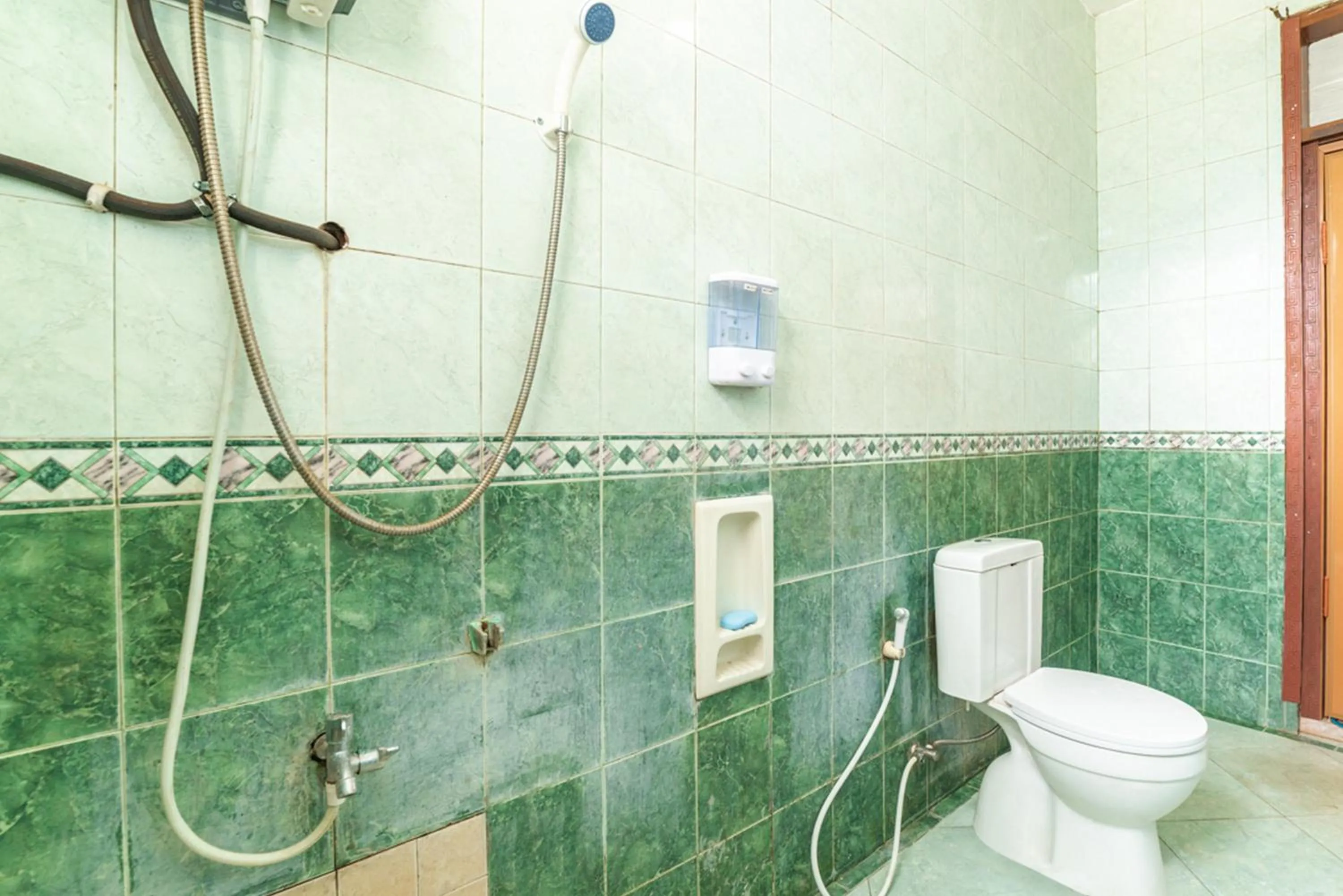 Bathroom in RedDoorz Syariah near Balai Kota Batu