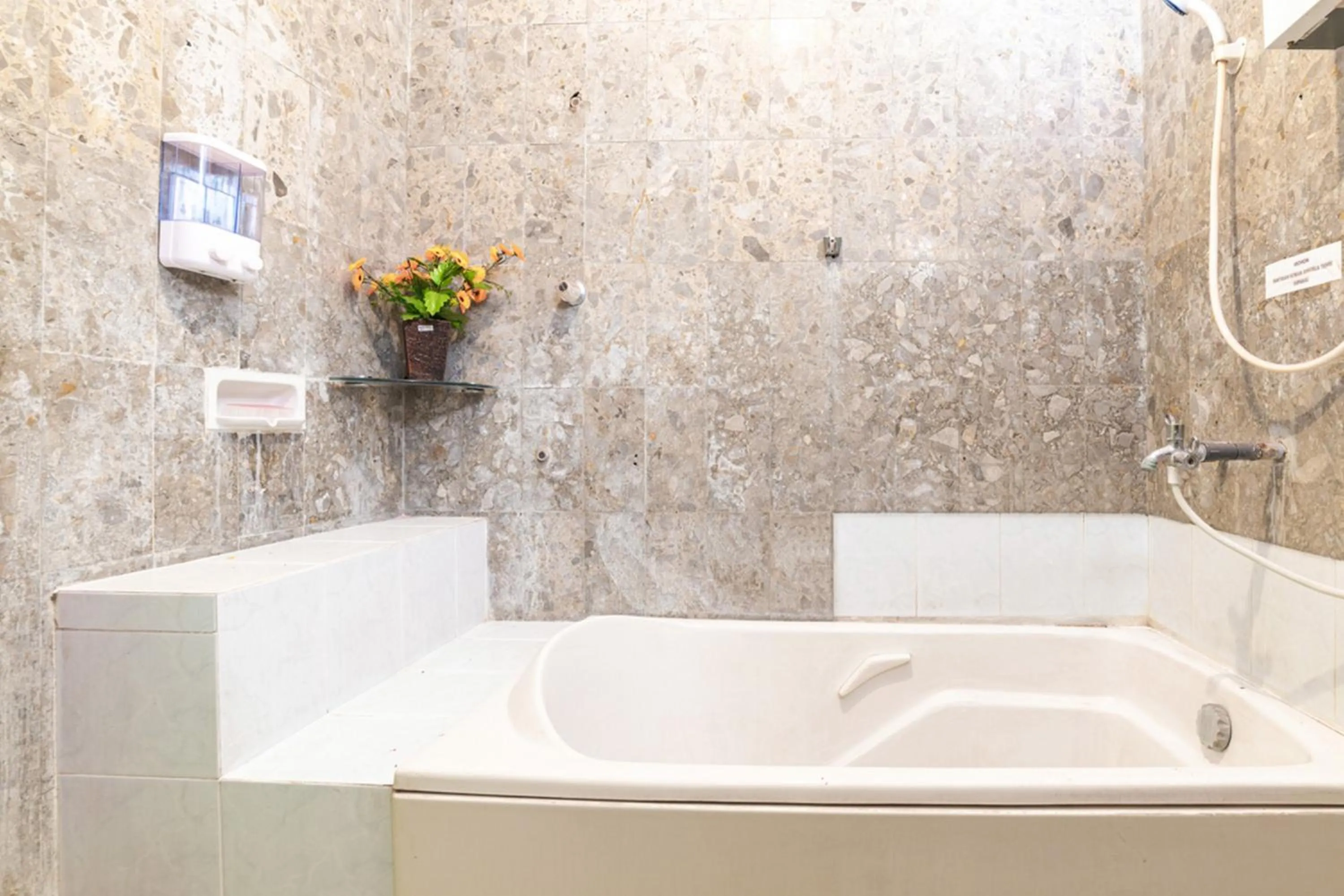 Bathroom in RedDoorz Syariah near Balai Kota Batu