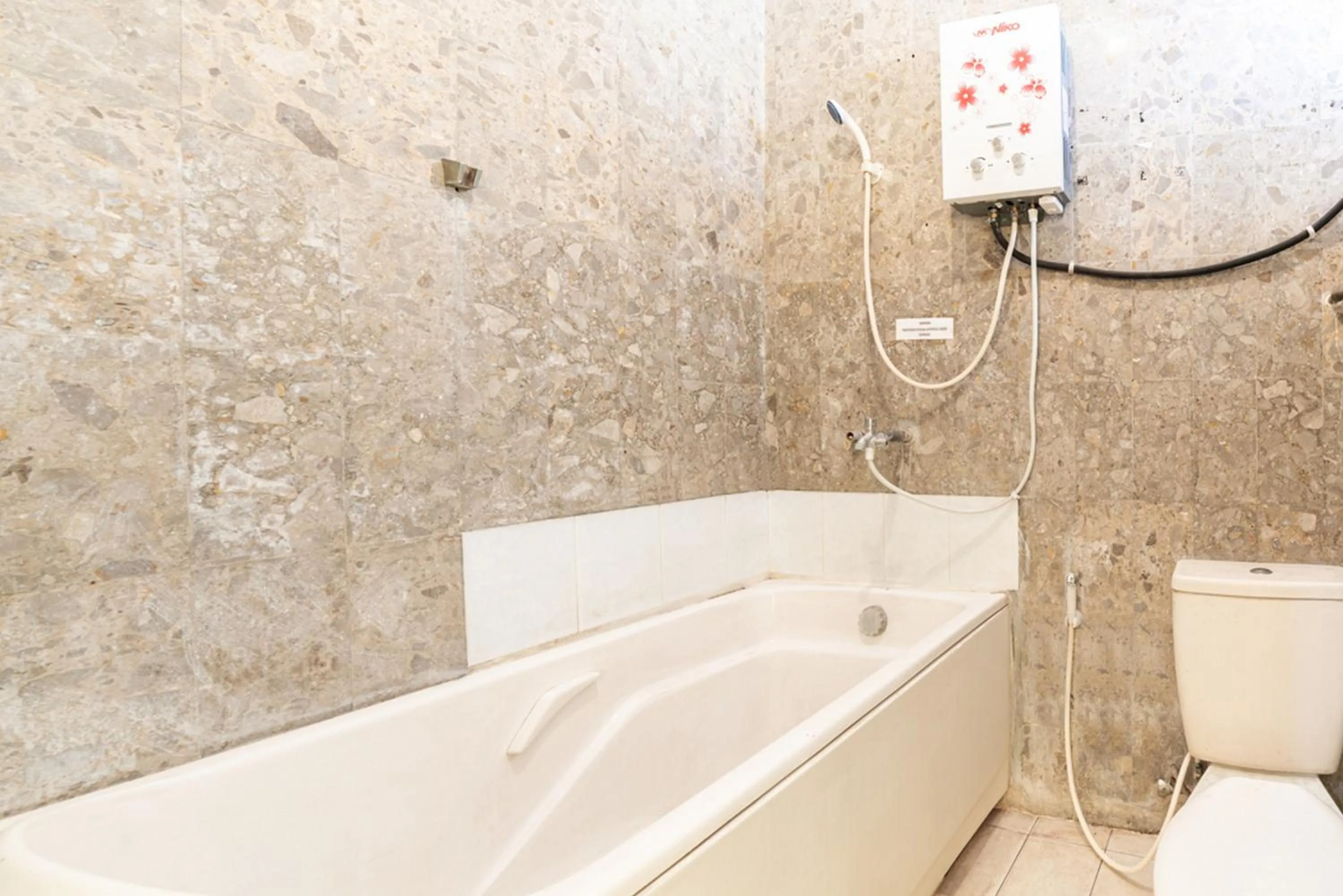 Bathroom in RedDoorz Syariah near Balai Kota Batu