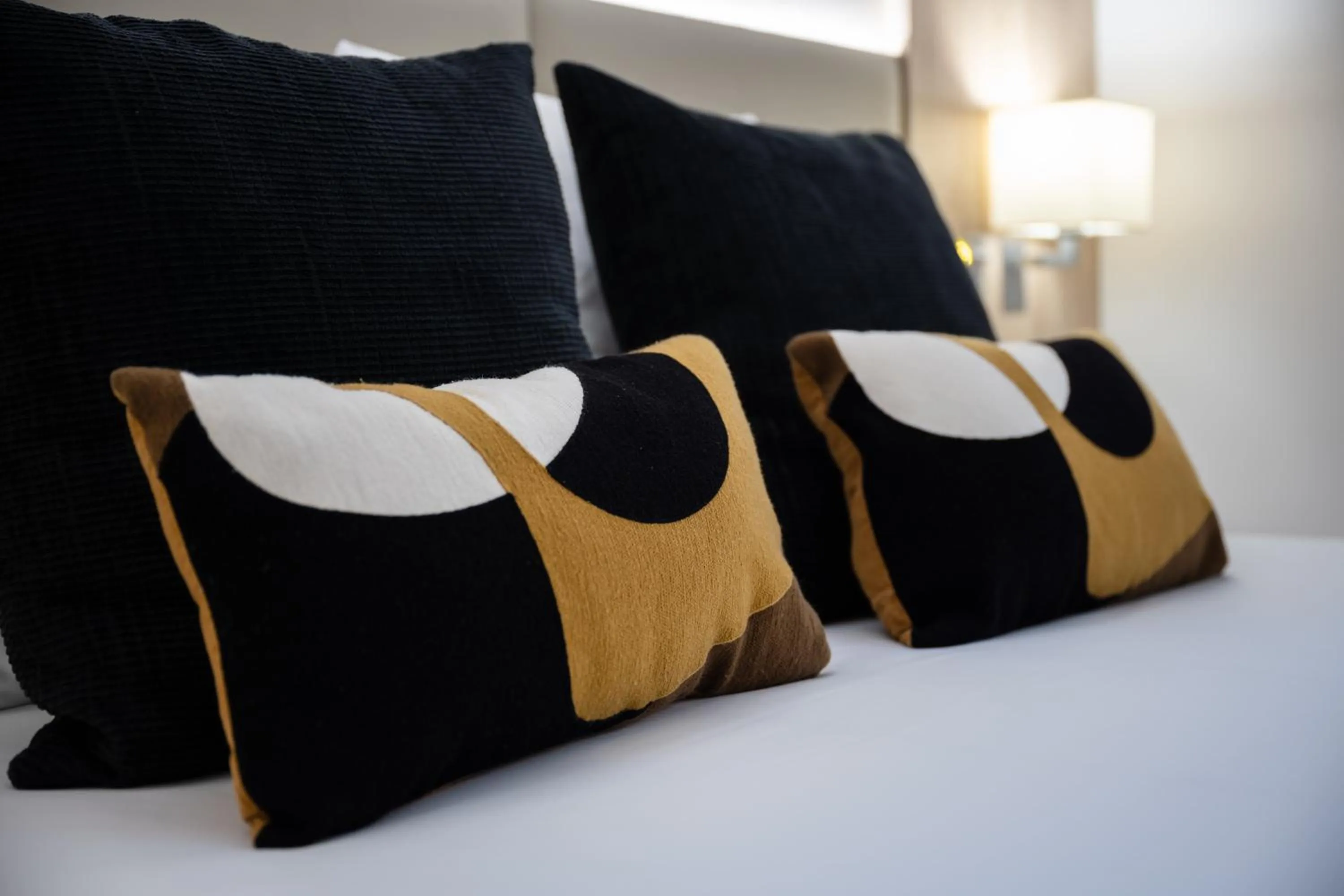 Decorative detail, Bed in Kyriad Beaune