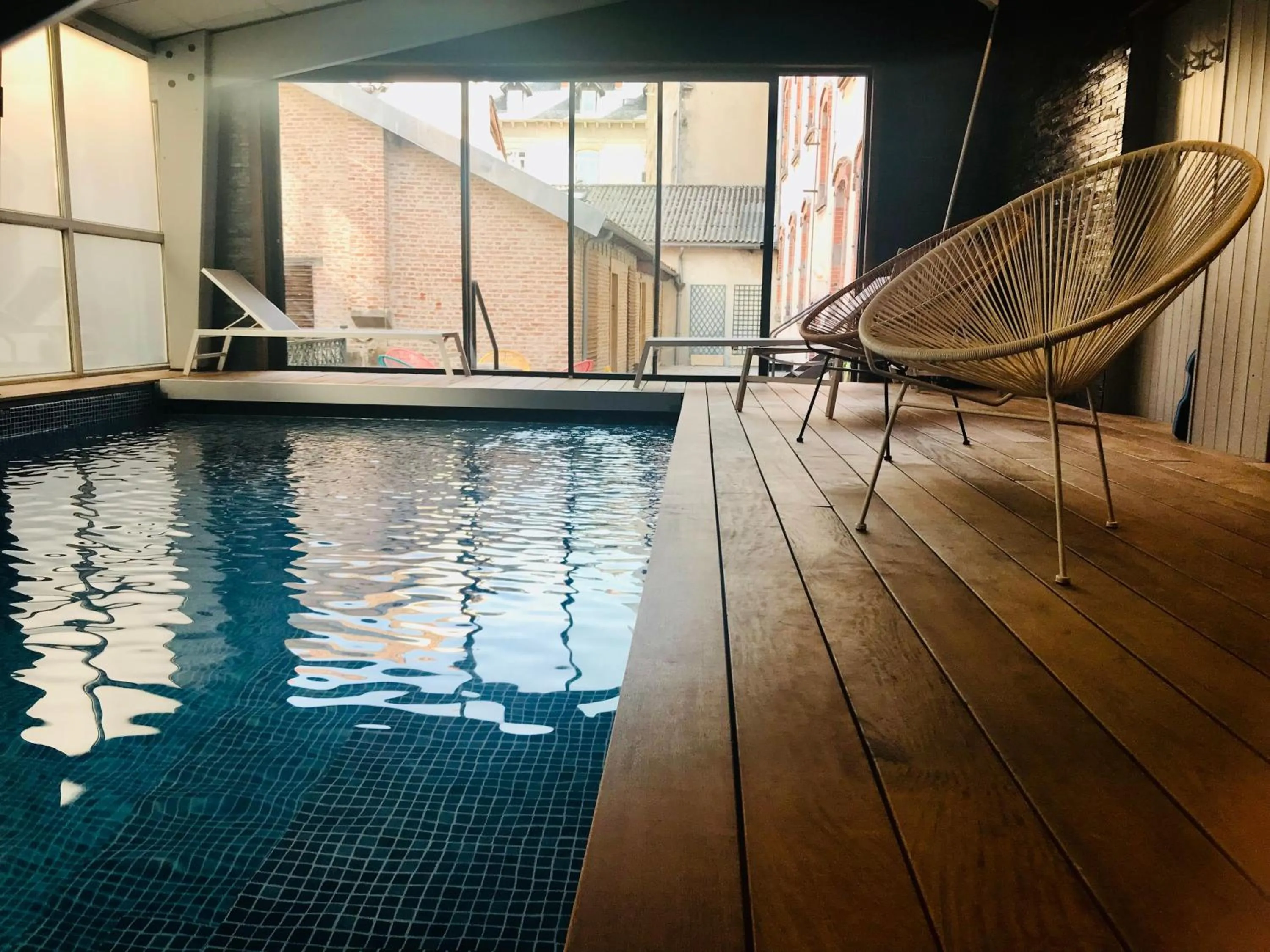 Swimming pool in The Originals Boutique, Grand Hôtel Saint-Pierre, Aurillac
