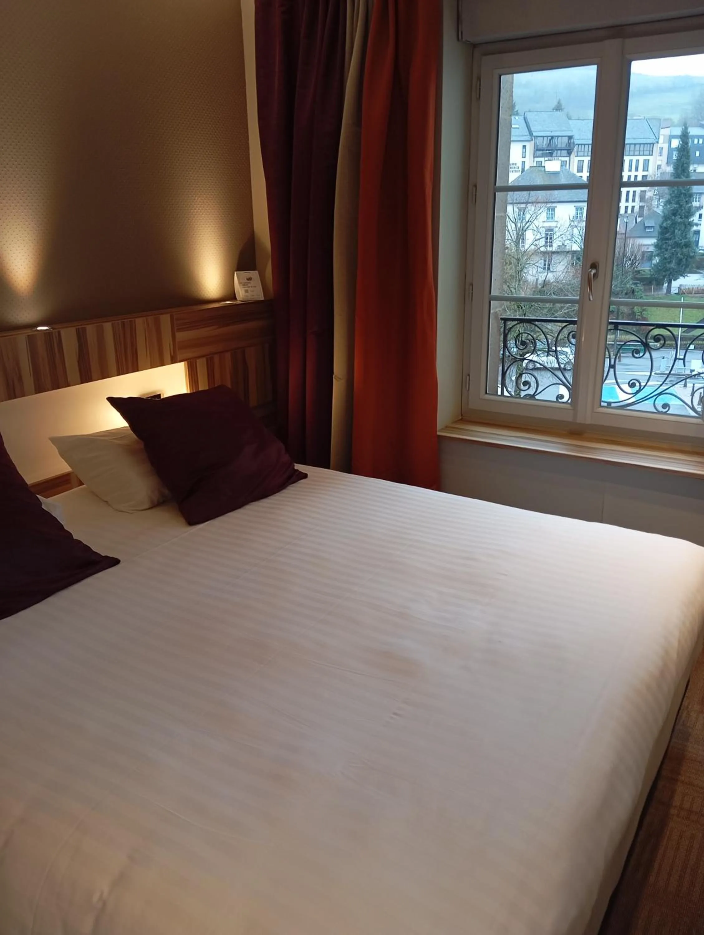 Photo of the whole room, Bed in The Originals Boutique, Grand Hôtel Saint-Pierre, Aurillac