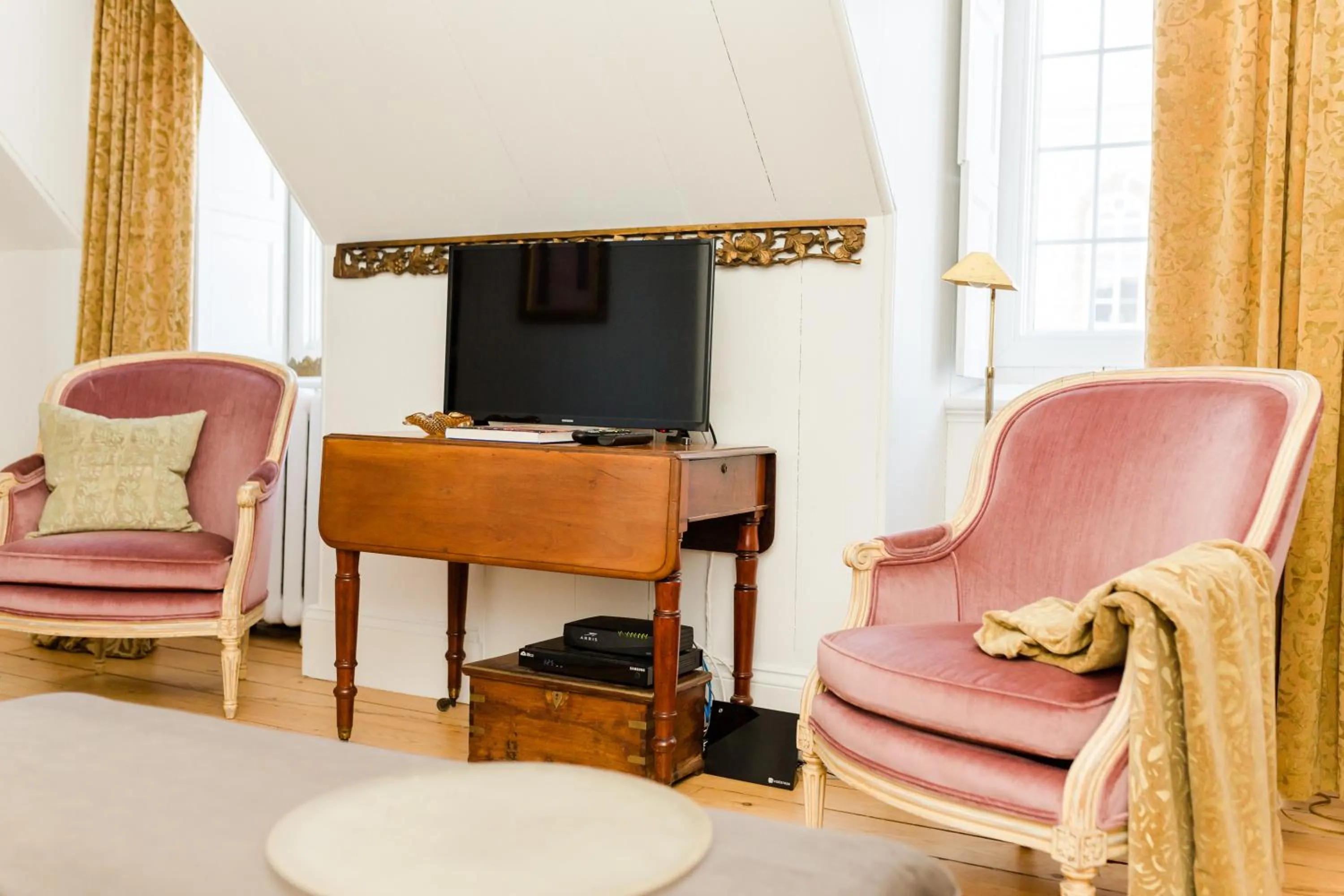 Communal lounge/ TV room in Le Vieux Presbytère