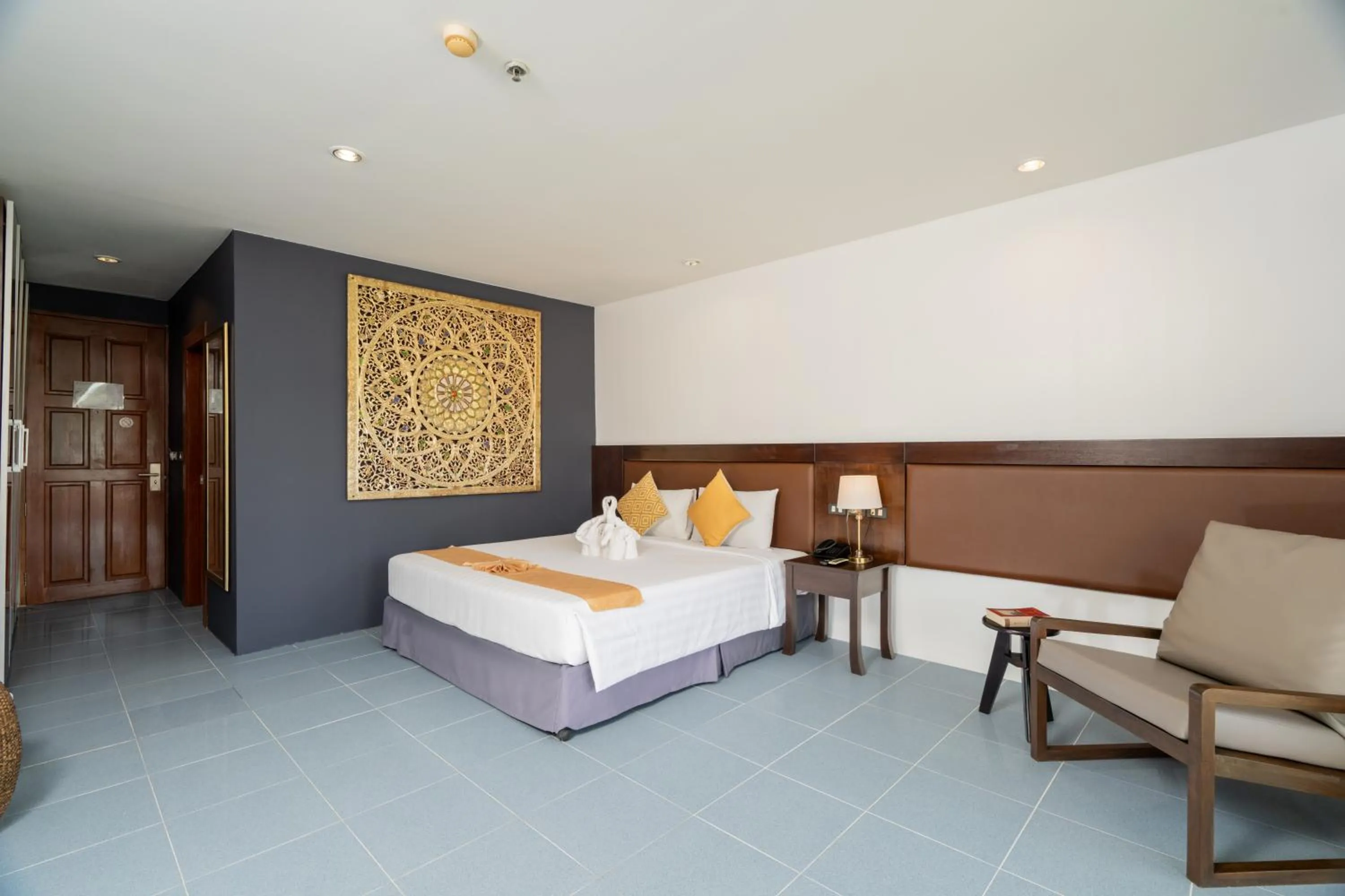 Bed in Blue Beach Grand Resort And Spa