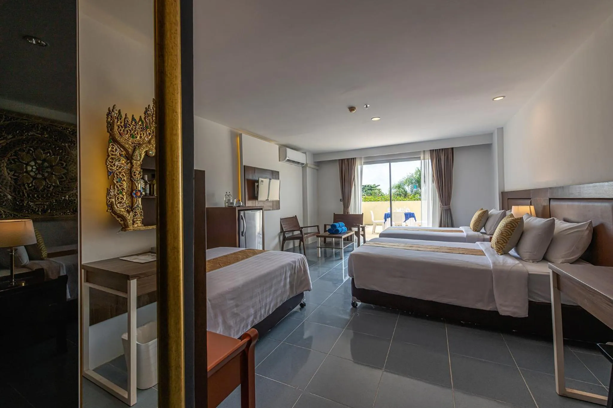 Bed in Blue Beach Grand Resort And Spa