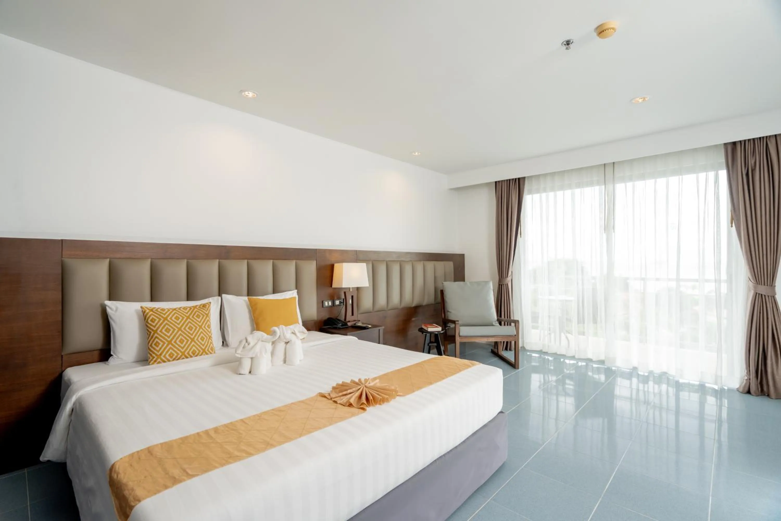 Bedroom, Bed in Blue Beach Grand Resort And Spa