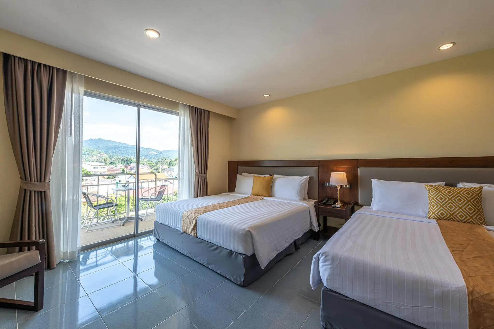 Bed in Blue Beach Grand Resort And Spa