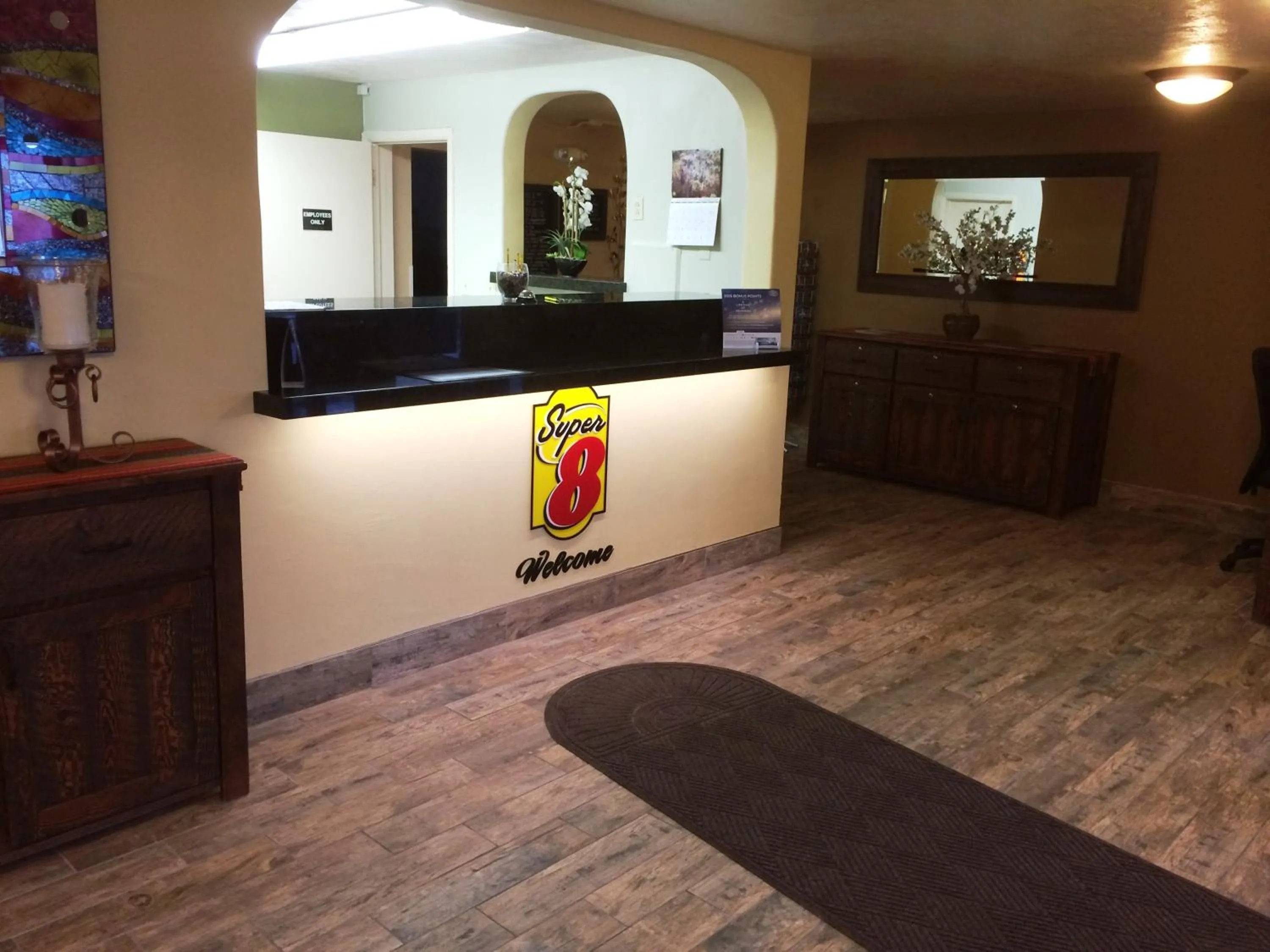 Property logo or sign in Super 8 by Wyndham Idaho Falls