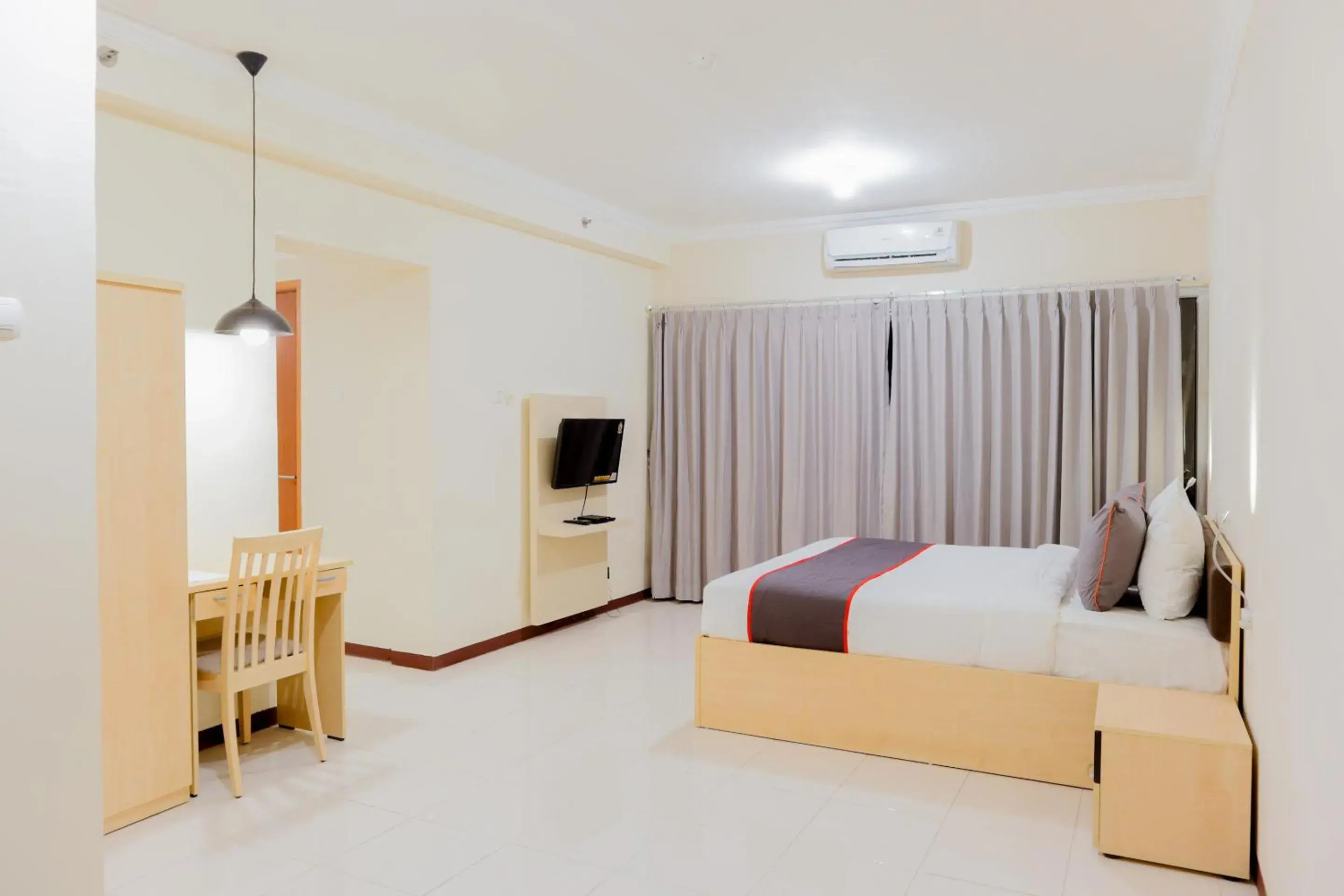 Bedroom in Collection O 6 Grand Palace Kemayoran