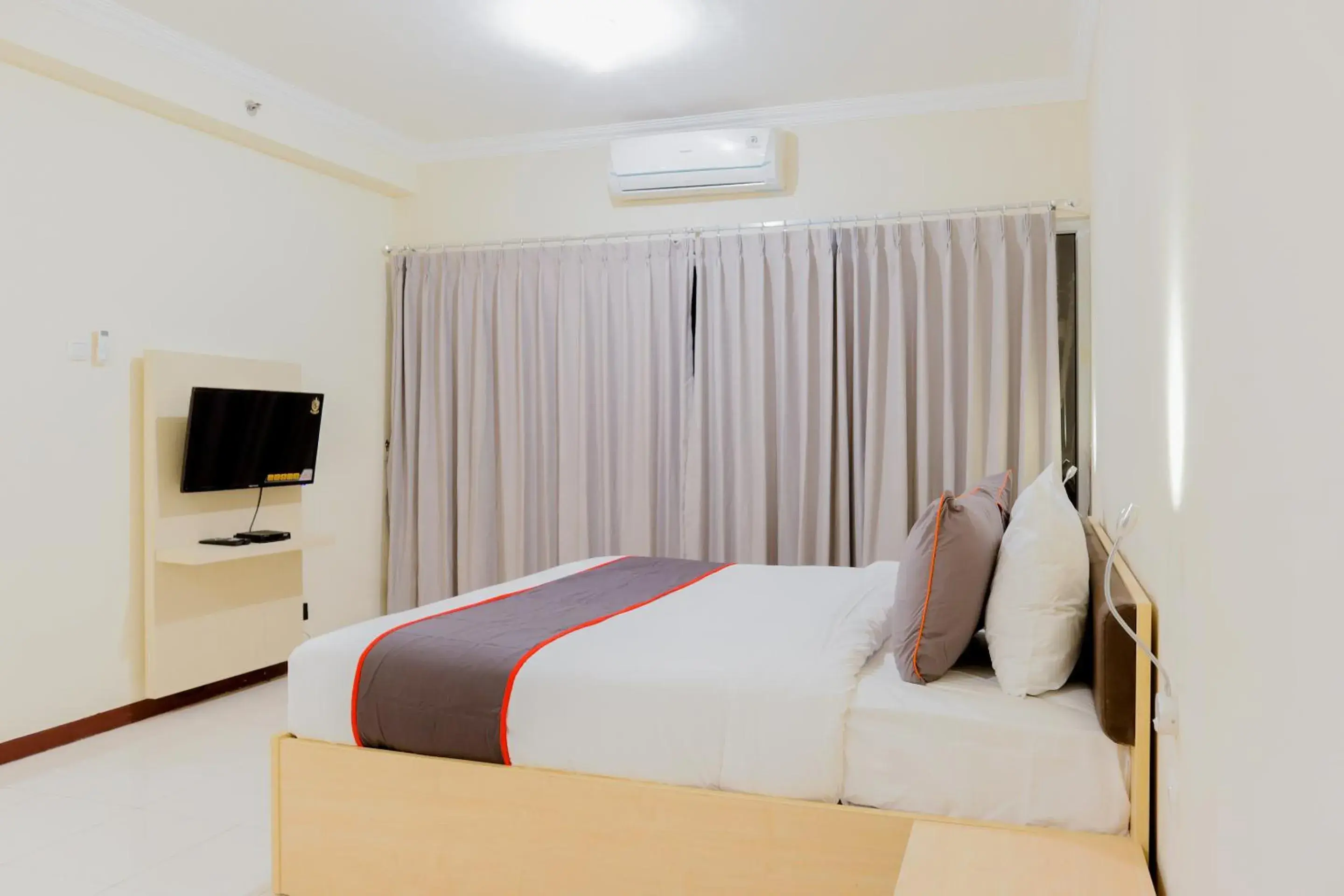 Bedroom in Collection O 6 Grand Palace Kemayoran