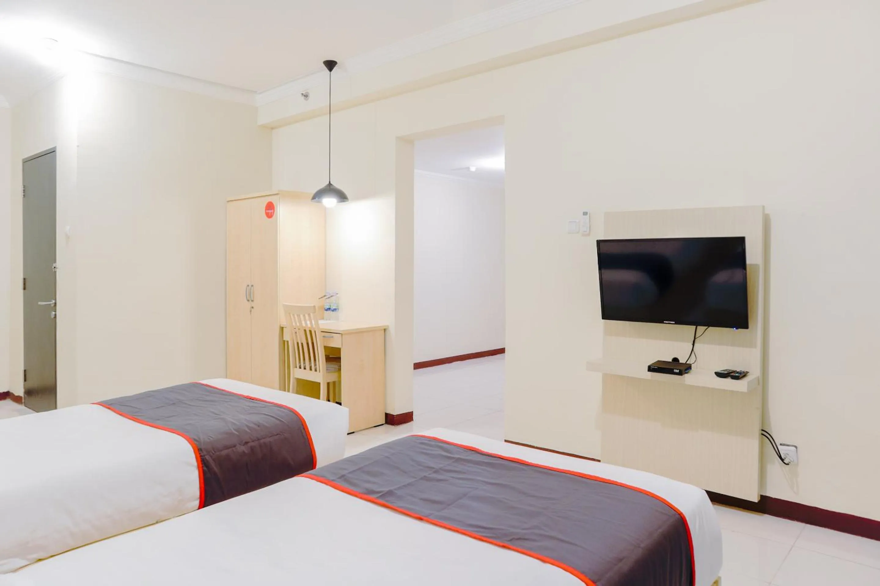 Bedroom, TV/Entertainment Center in Collection O 6 Grand Palace Kemayoran