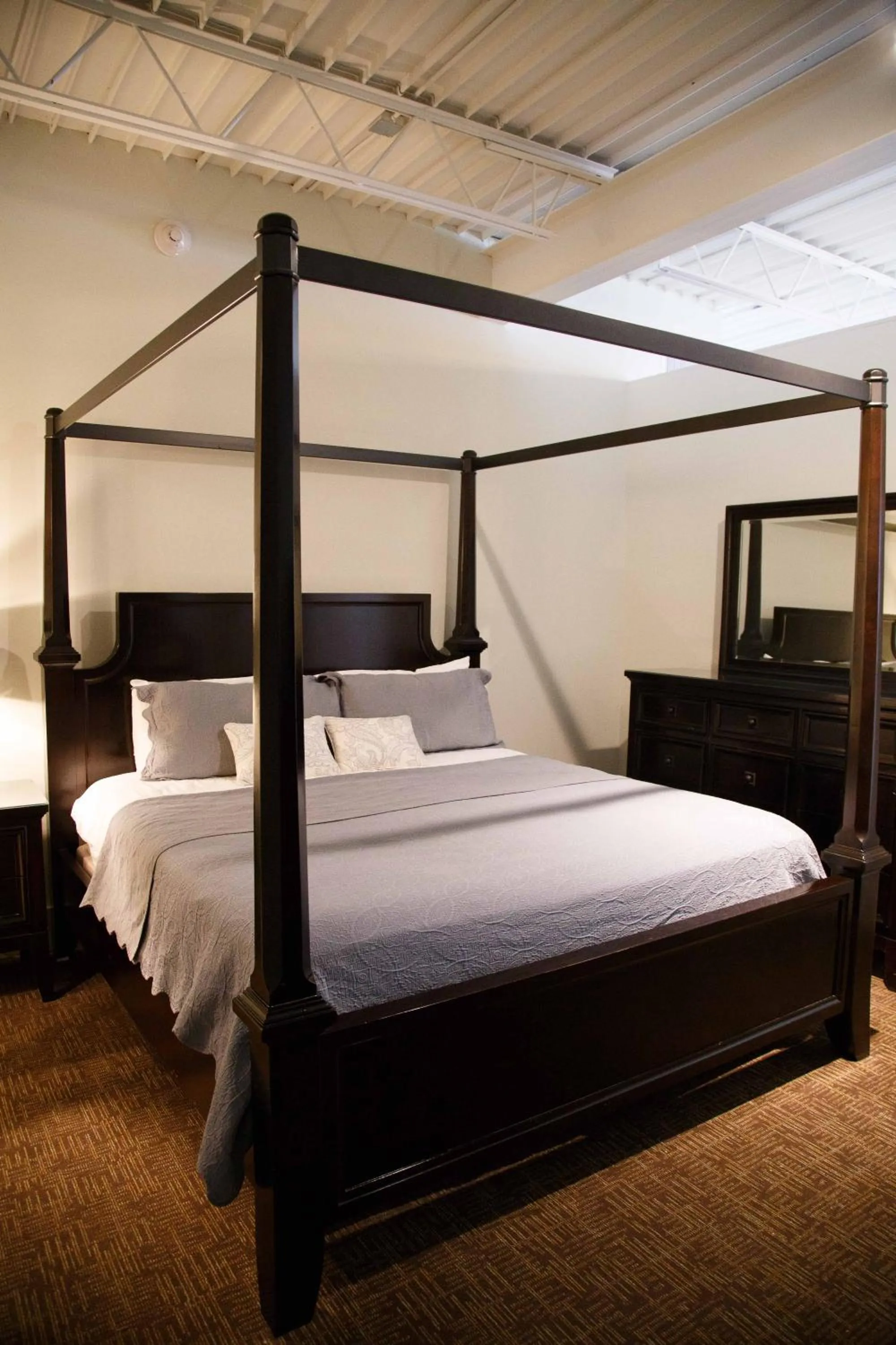 Bed in The Lofts at the Five & DIme