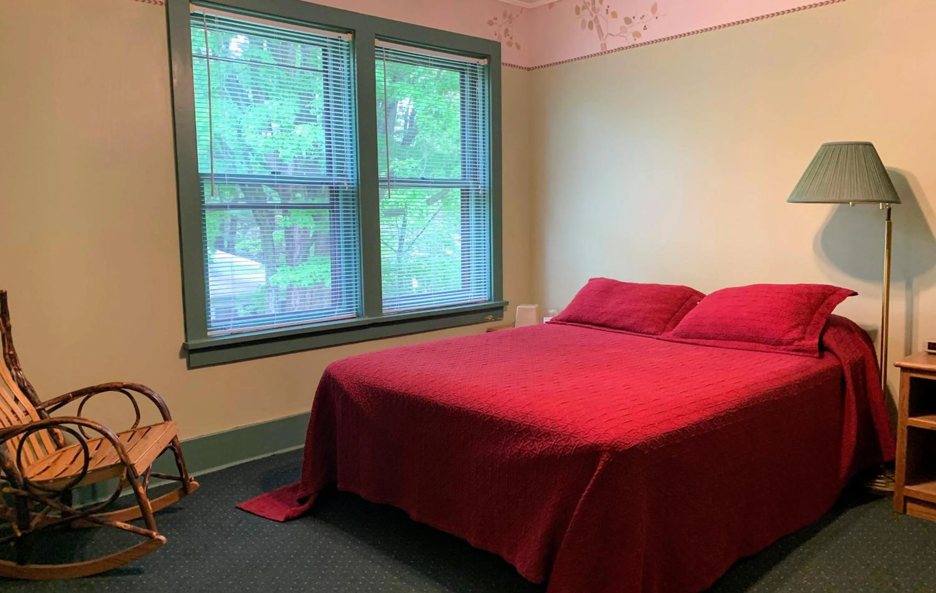 Bed in Gordon Beach Inn