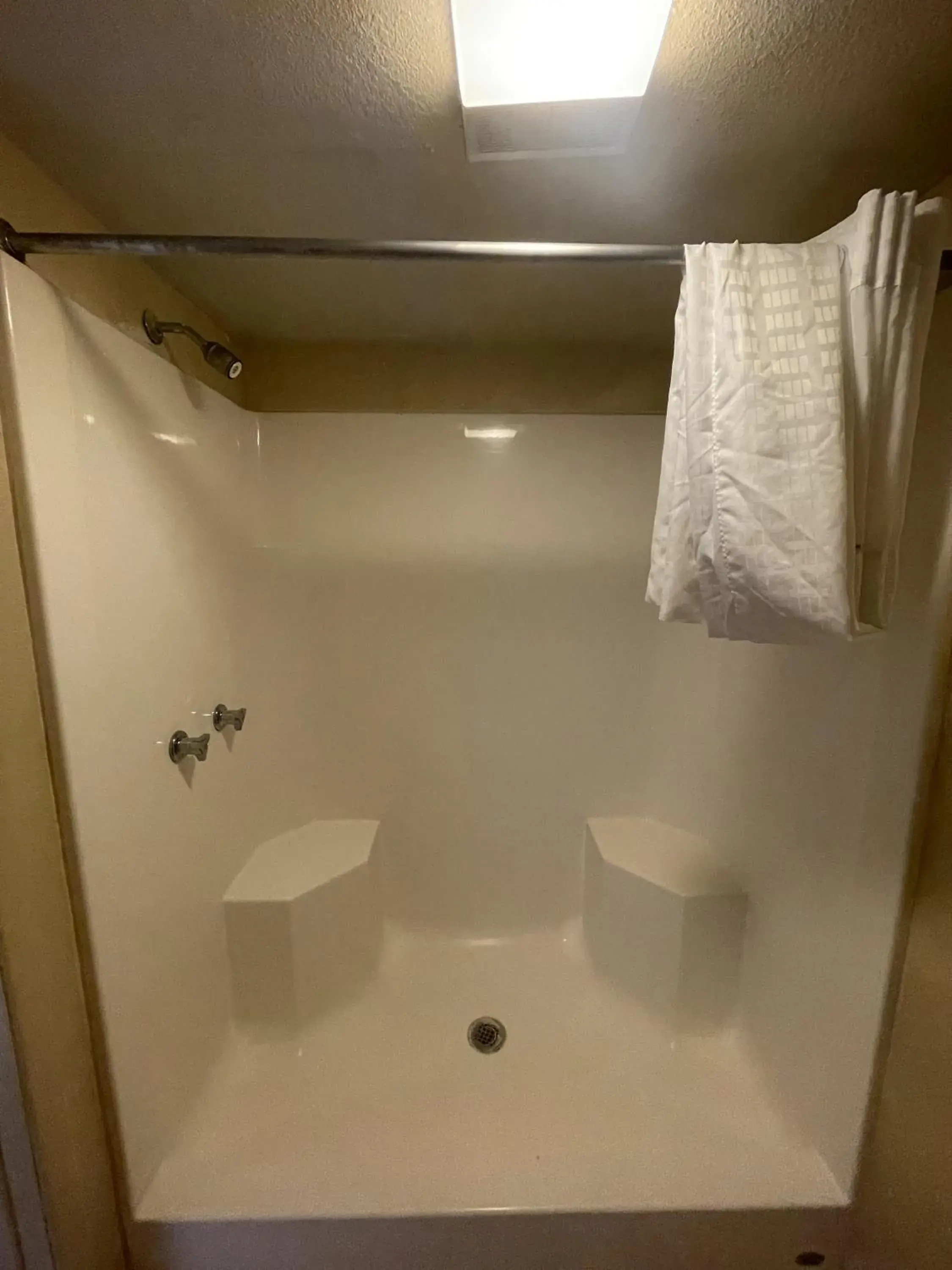 Shower, Bathroom in Travelodge by Wyndham Farmington Hwy 64