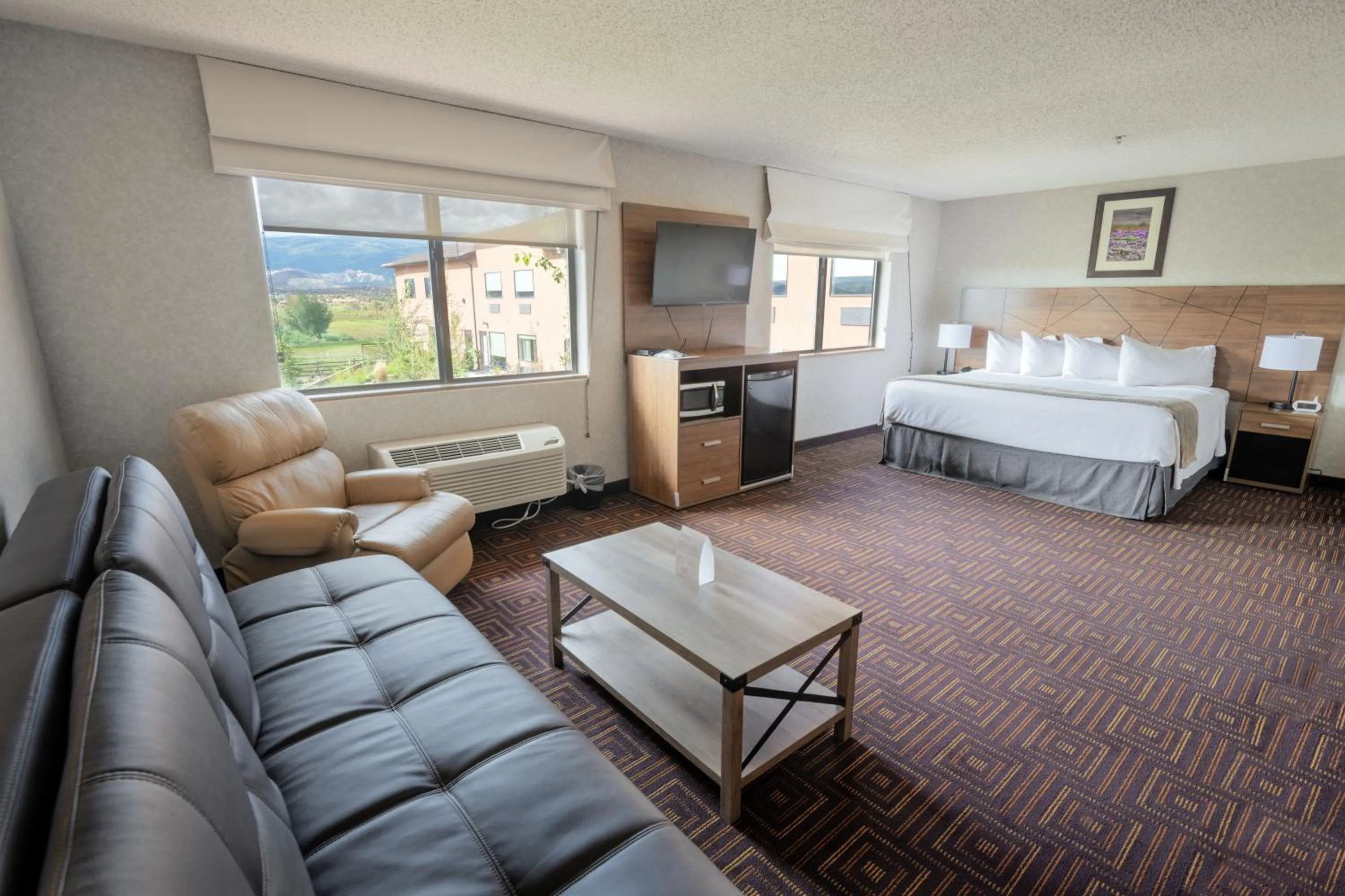 Photo of the whole room, Bed in Red Sands Hotel