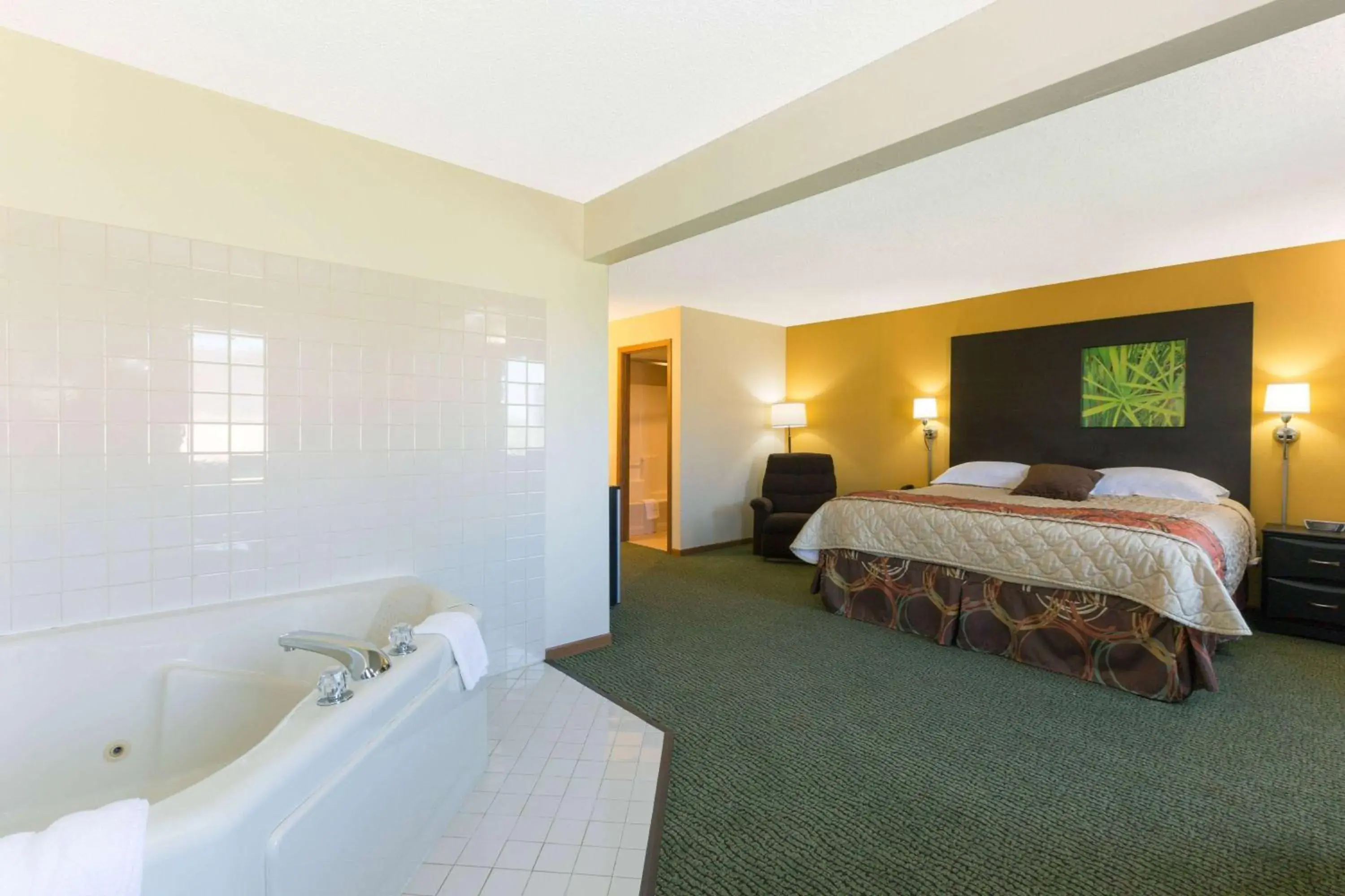 Photo of the whole room, Bed in Super 8 by Wyndham Perry IA Photo of the whole room, Bed in Super 8 by Wyndham Perry IA