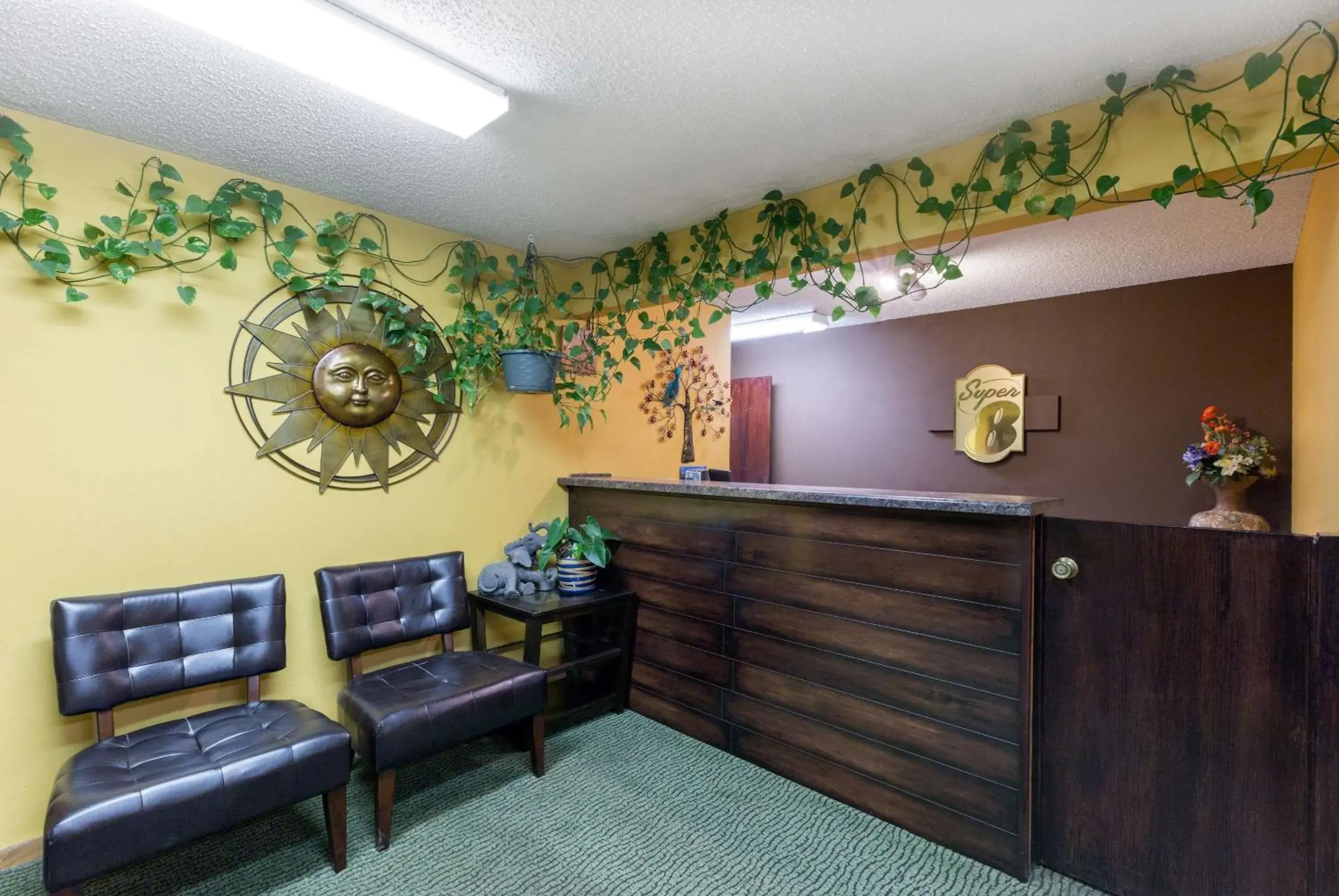 Lobby or reception in Super 8 by Wyndham Perry IA Lobby or reception in Super 8 by Wyndham Perry IA