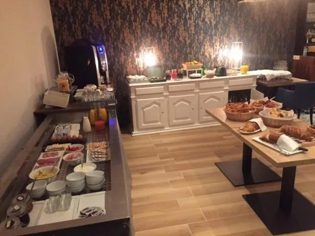 Buffet breakfast in Le Galion Hotel et Restaurant Canet Plage - Logis
