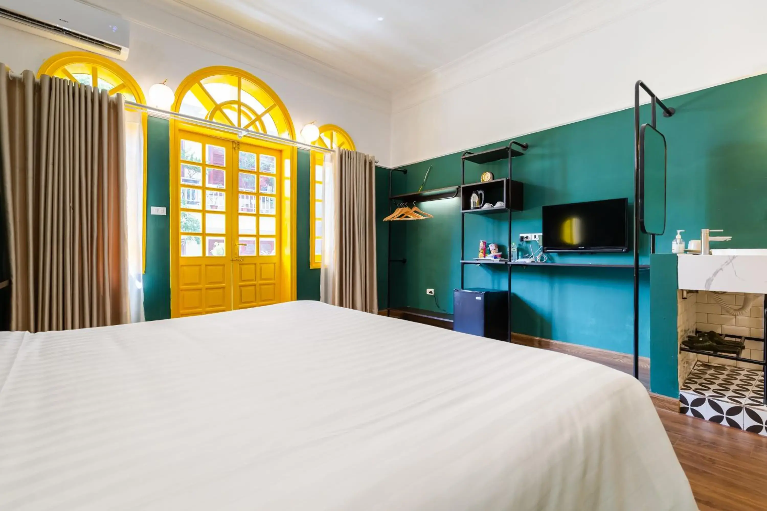 Bed in The Poppy Villa & Hotel Bed in The Poppy Villa & Hotel