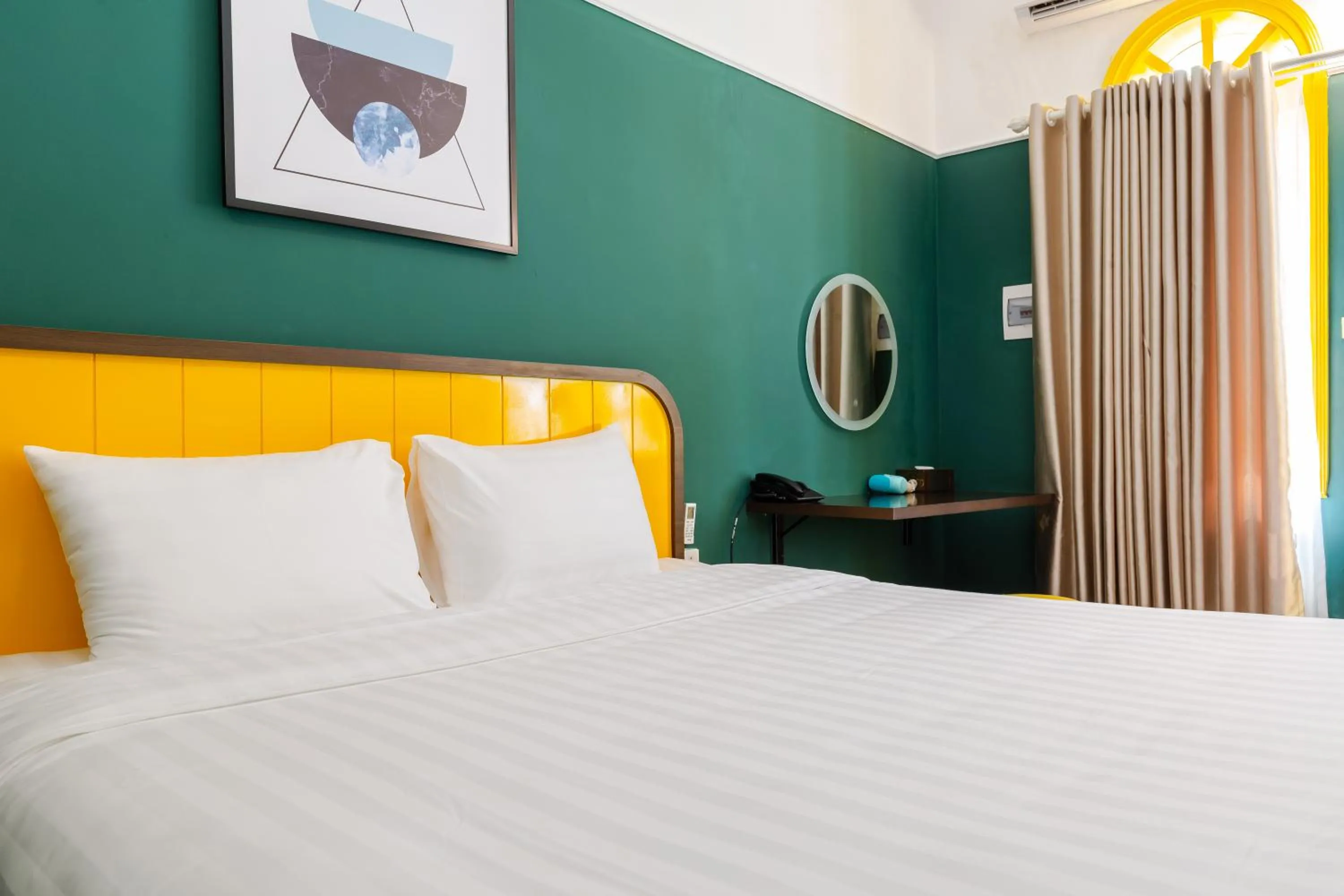 Bed in The Poppy Villa & Hotel