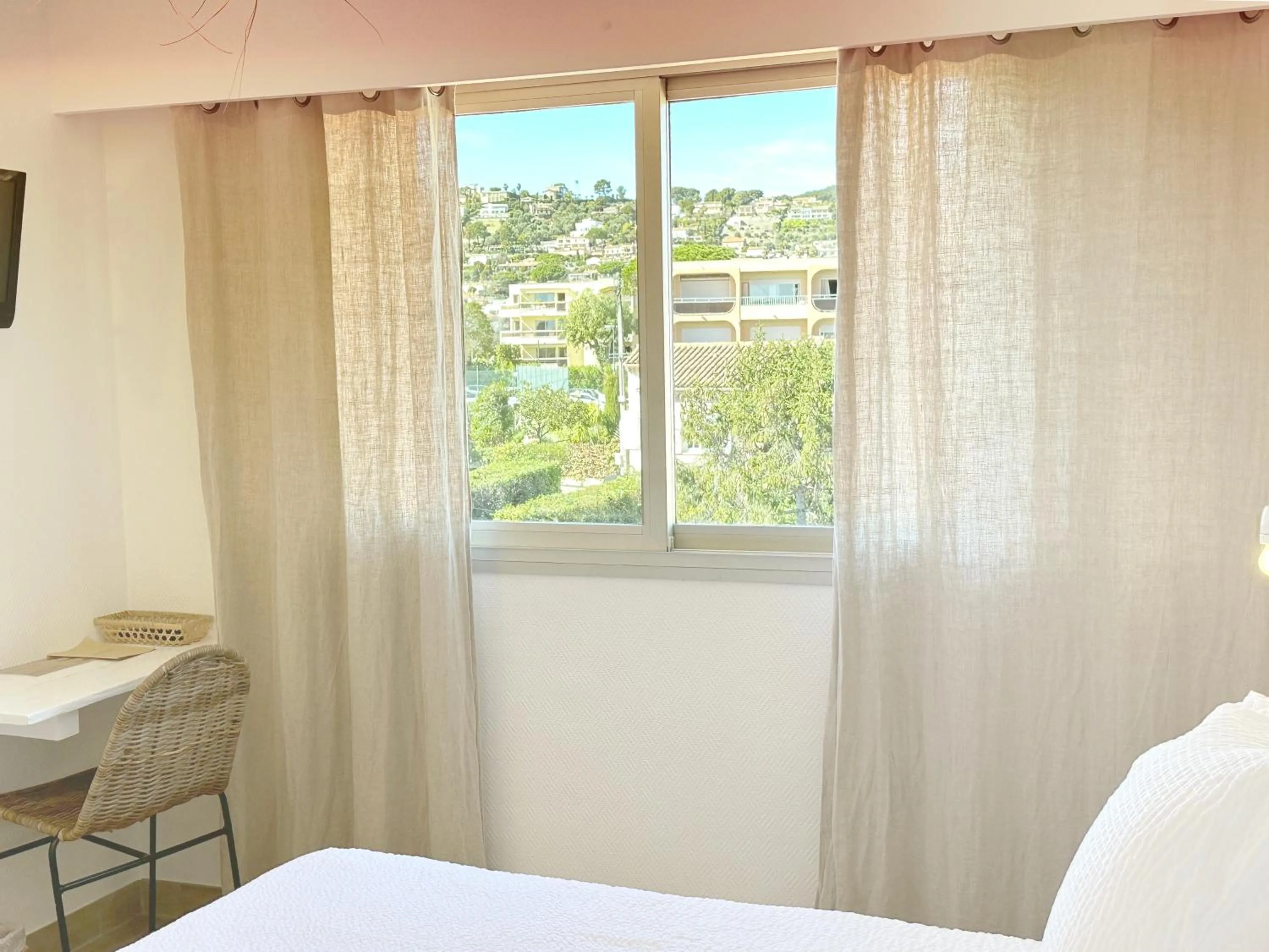 View (from property/room), Bed in Blanc Sable Hôtel