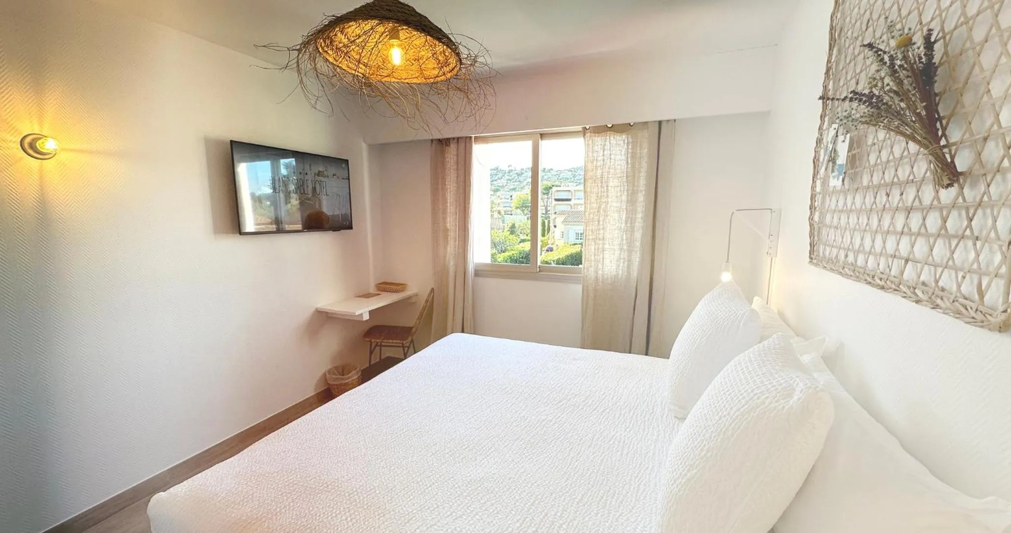 Bed in Blanc Sable Hôtel