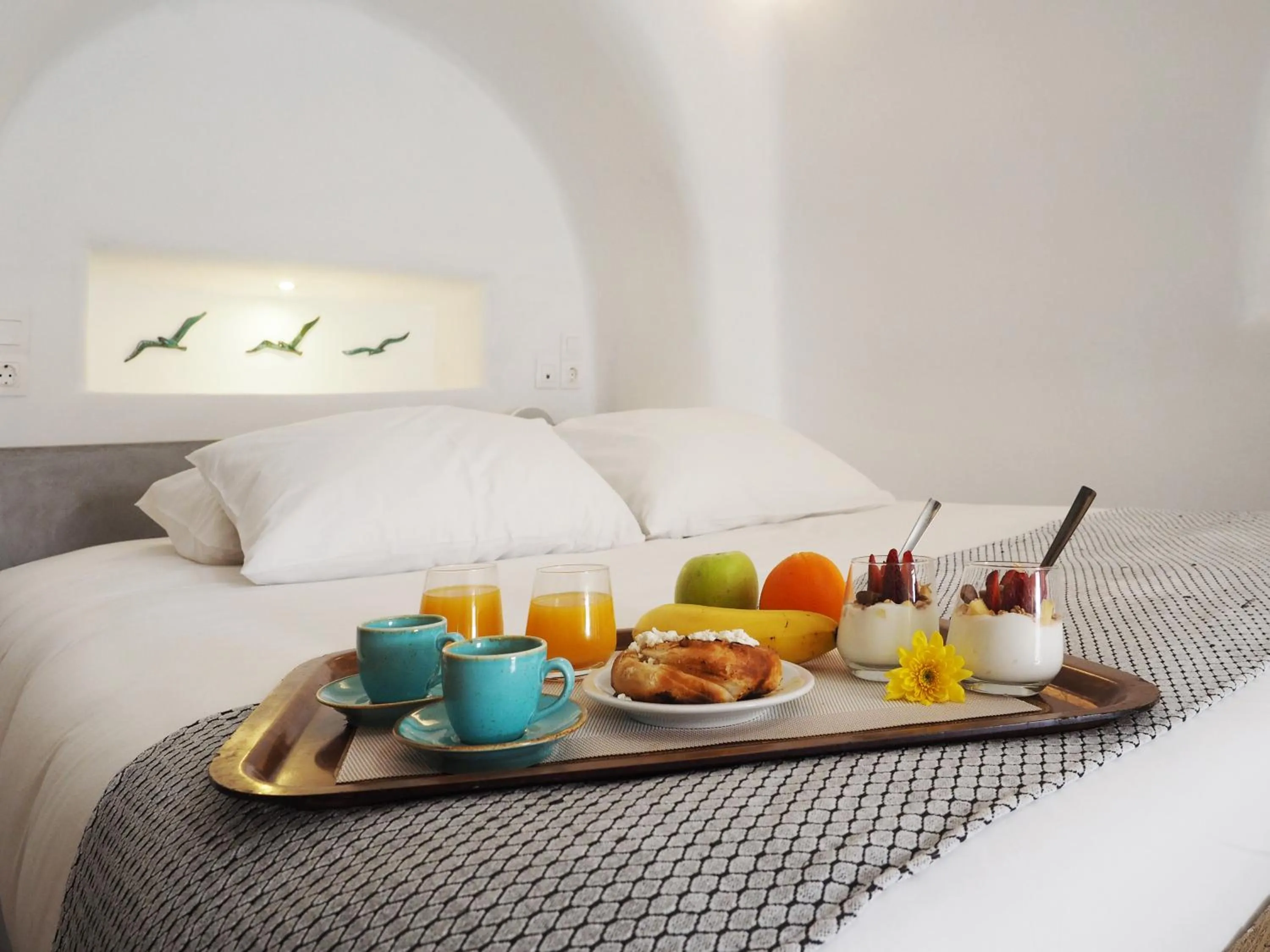 Bed in Danae Suites Santorini