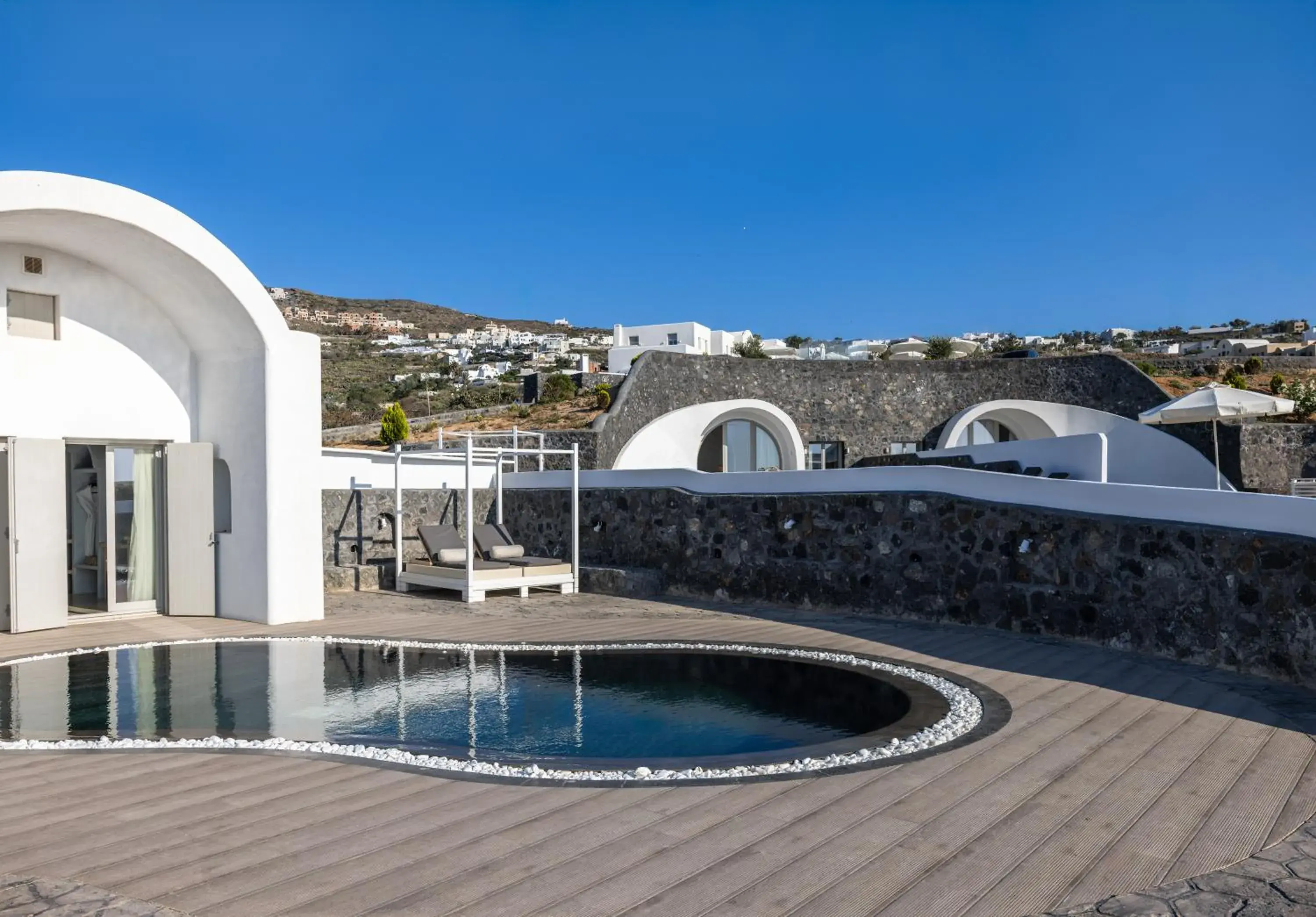 Pool view in Danae Suites Santorini Pool view in Danae Suites Santorini